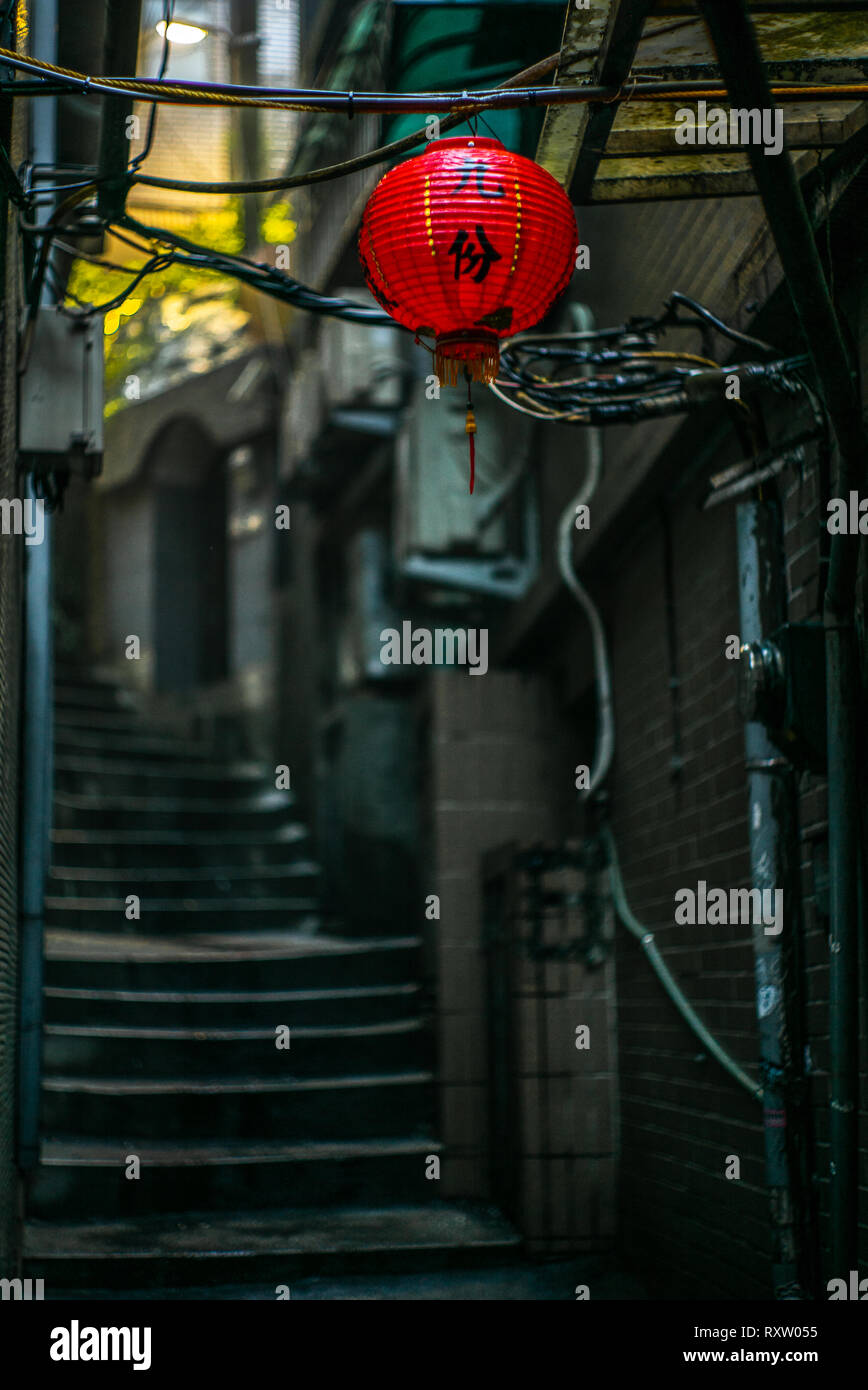 Chinese red lantern hanging from a roof in the Taiwanese village of ...
