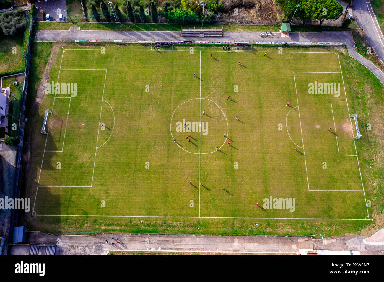 Top view from drone of football soccer field Two teams playing a match