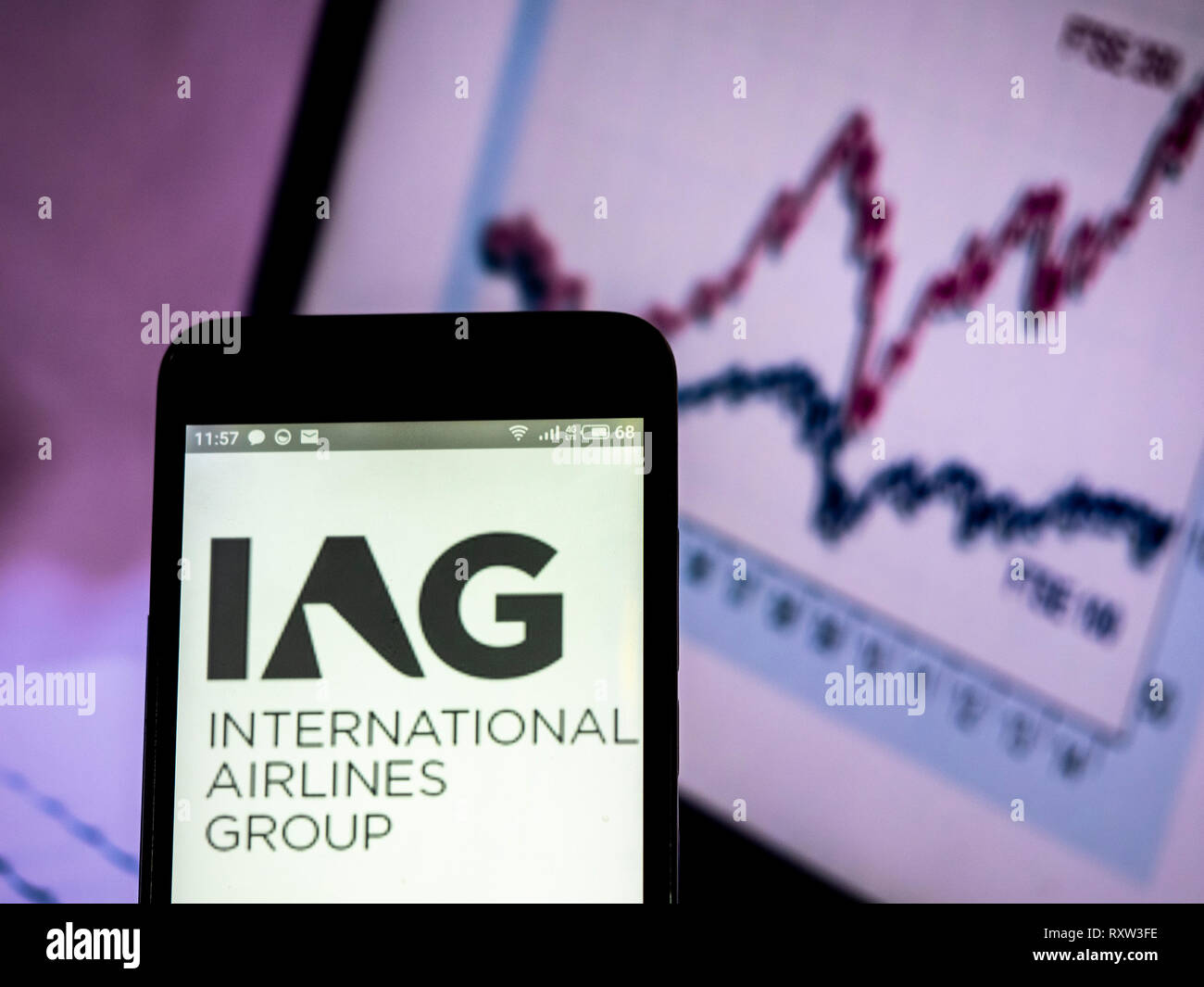 International Airlines Group logo seen displayed on smart phone. Stock Photo