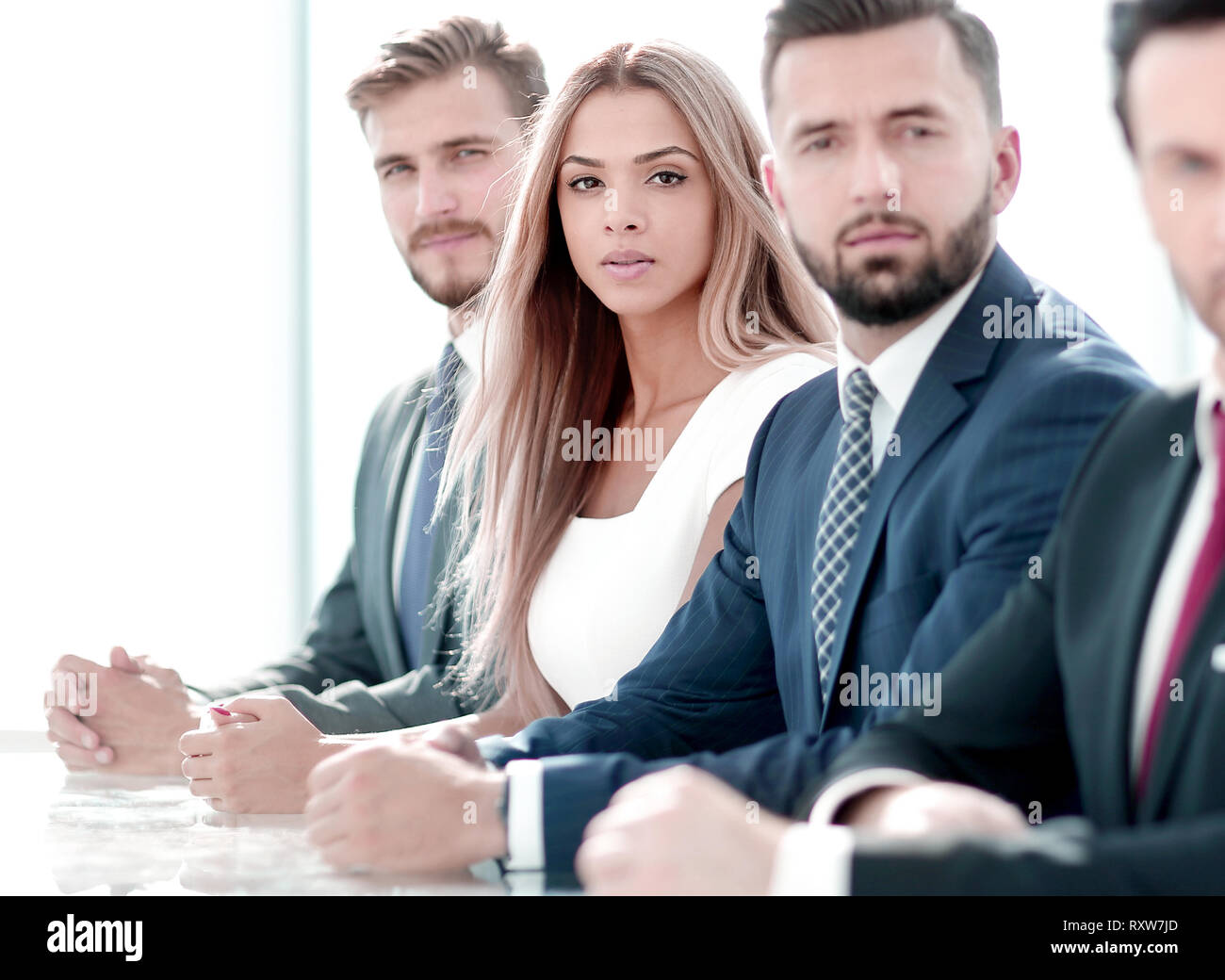 business group sitting at the negotiating table Stock Photo