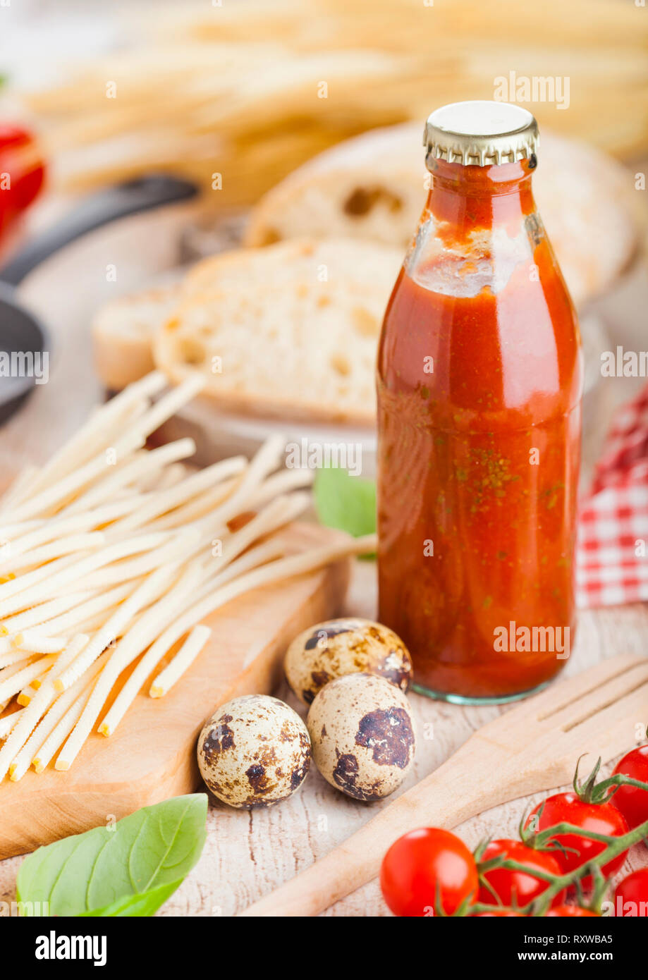 Homemade Spaghetti Pasta With Quail Eggs With Bottle Of Tomato Sauce And Cheese On Wooden Background Classic Italian Village Food Garlic Black And Stock Photo Alamy Homemade Spaghetti Pasta With Quail Eggs With Bottle Of Tomato Sauce And Cheese On Wooden Background Classic Italian Village Food Garlic Black And Stock Photo Alamy