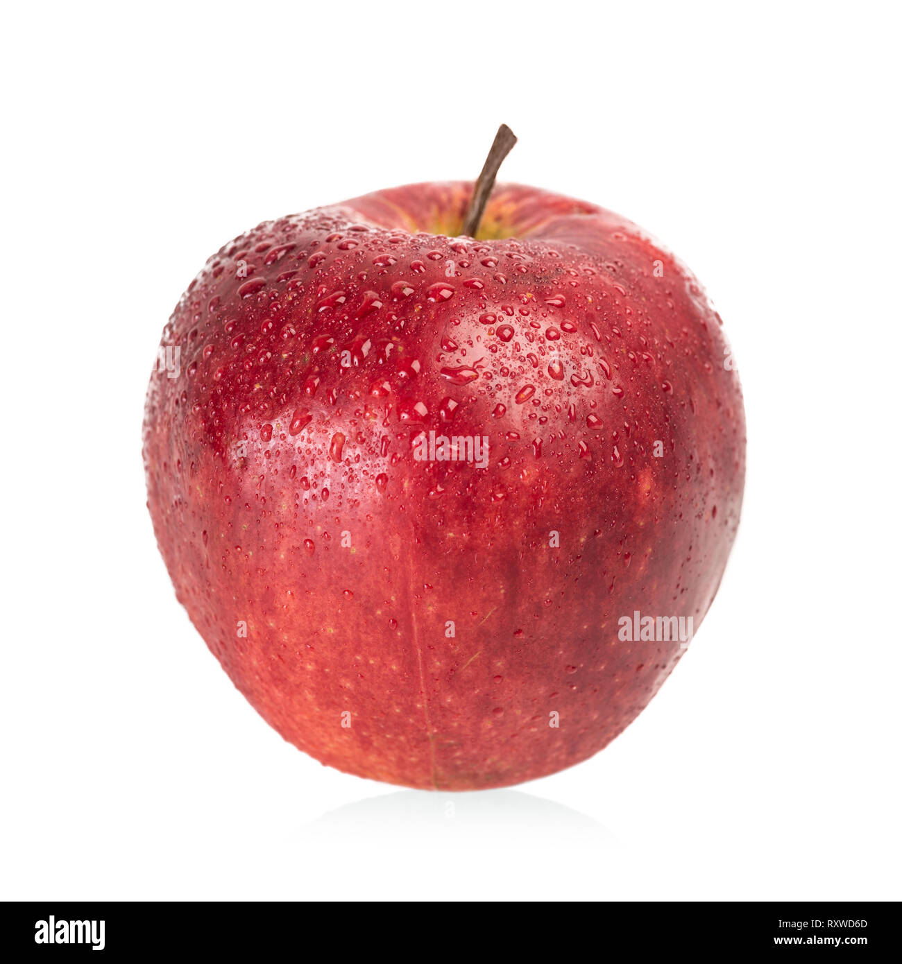 Apple with waper drops on a white background Stock Photo