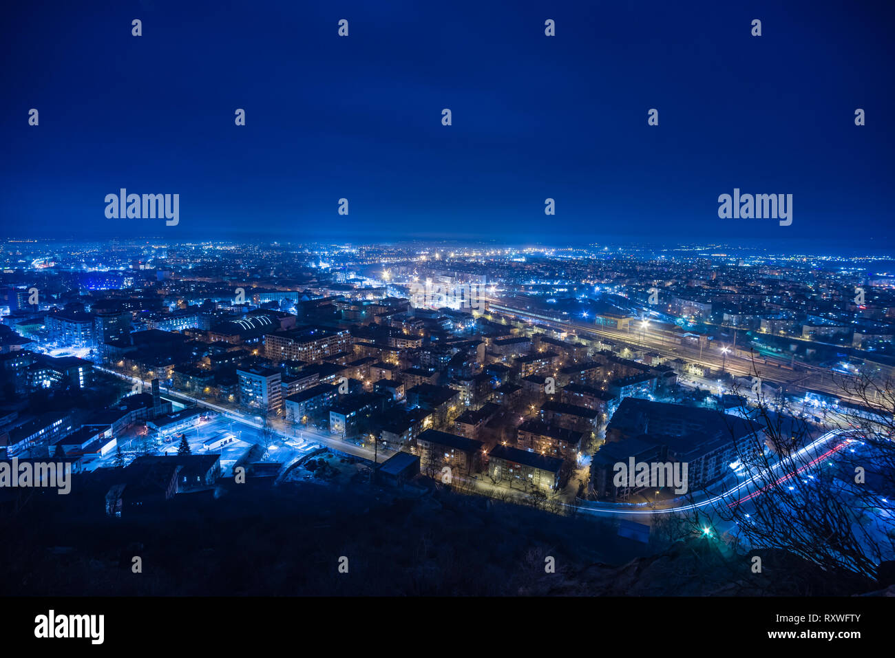 Beautiful Blue light city night scape in cold winter night Stock Photo