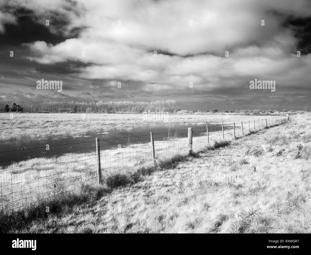 An infrared image of farmland at Medmerry Nature Reserve, West Sussex, England. Stock Photo