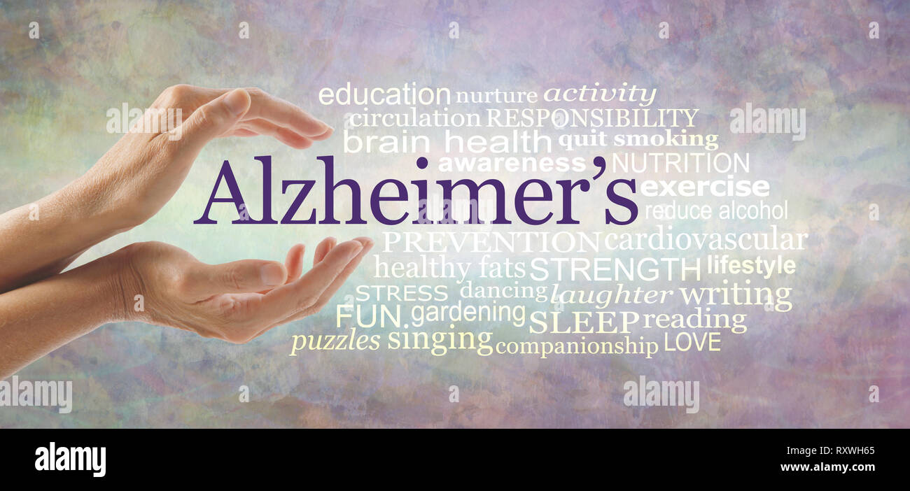 Alzheimer's Word Cloud - female hands gently cupped around the word ALZHEIMER'S and a relevant word cloud on a pale rustic background Stock Photo