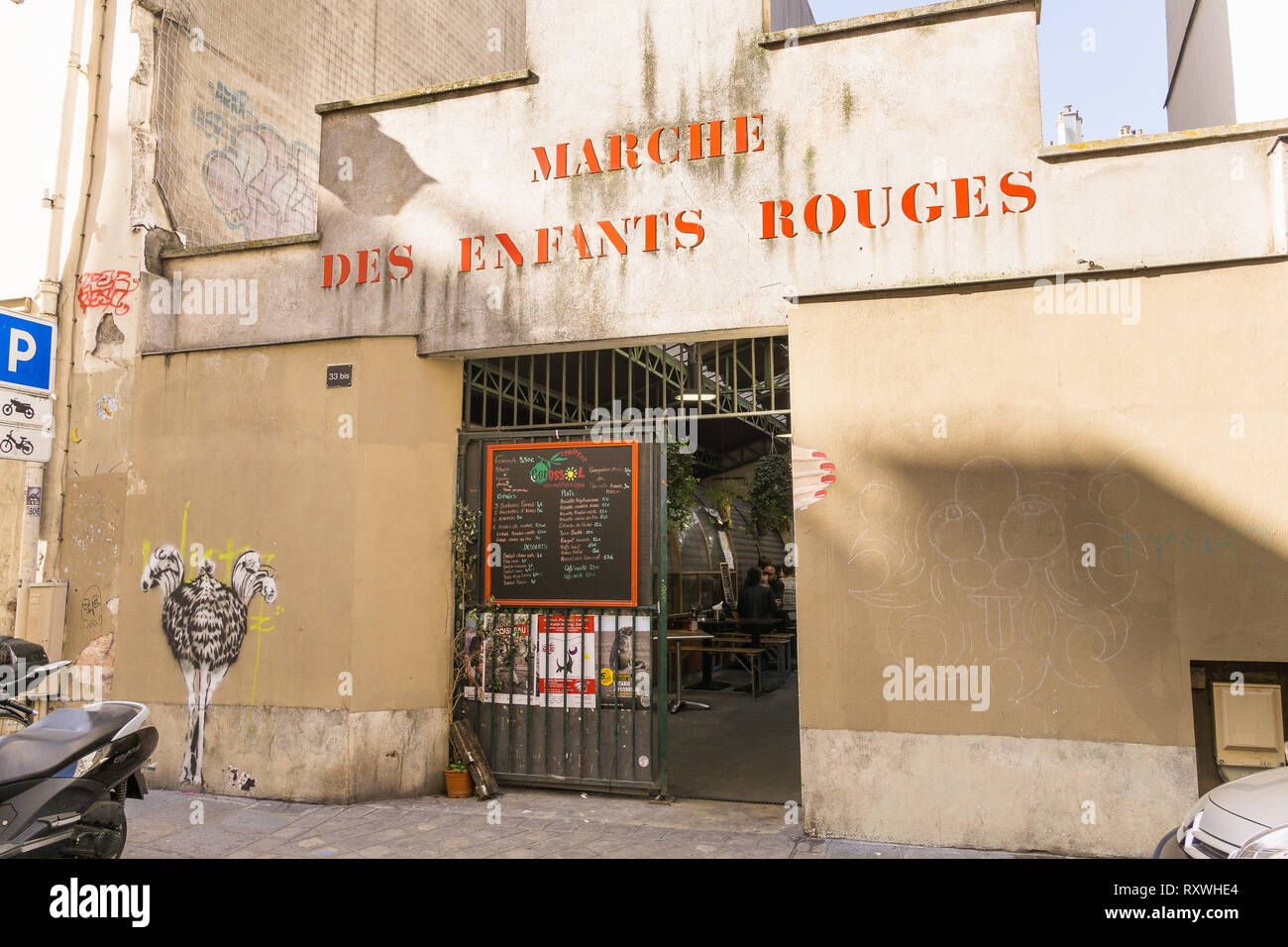 Paris food market - Entrance to the Marche des Enfants Rouges, food market in the Marais district of Paris, France, Europe. Stock Photo