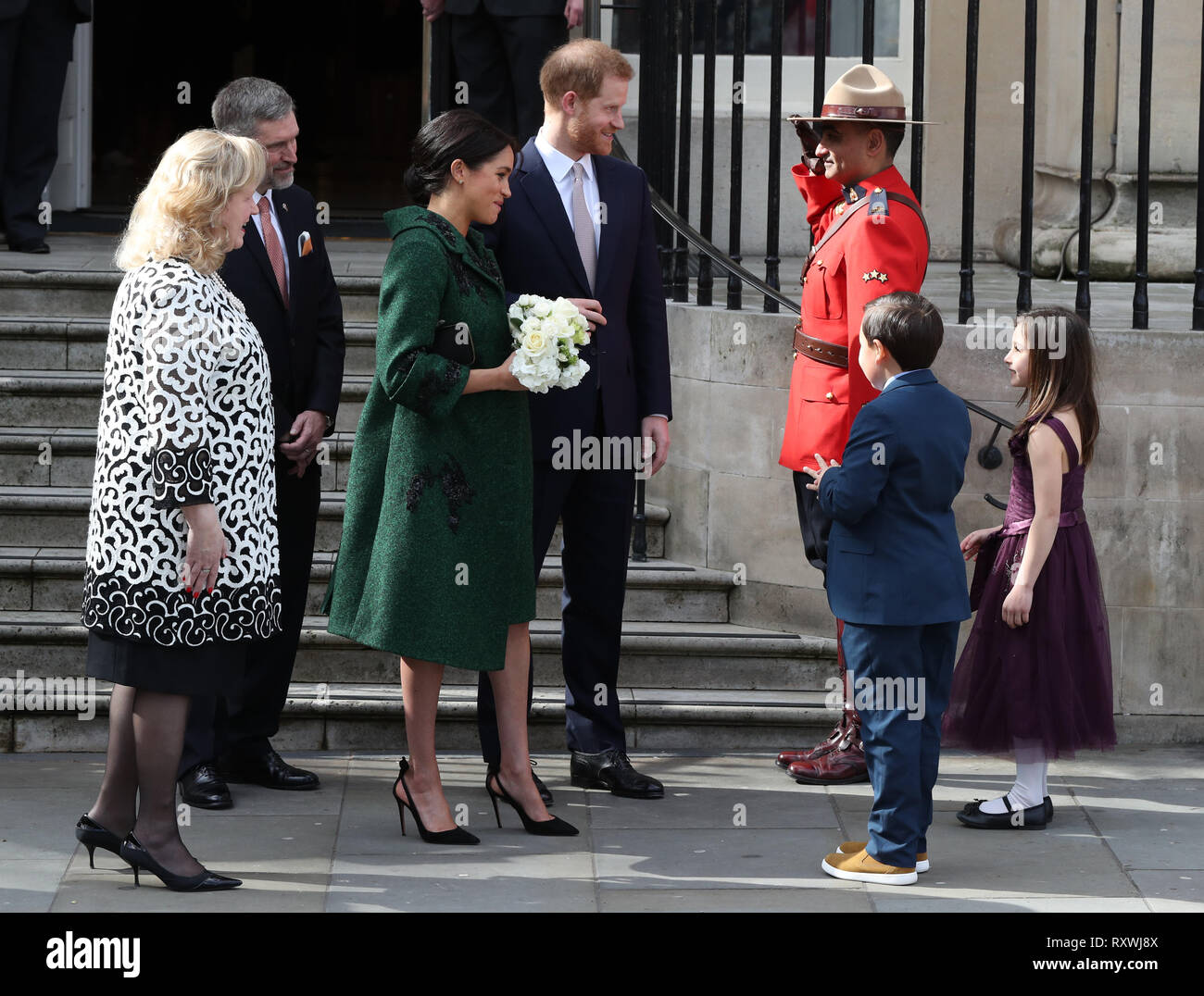 The Duke and Duchess of Sussex leave Canada House in London after a Commonwealth Day youth event celebrating the diverse community of young Canadians living in London and around the UK. Stock Photo