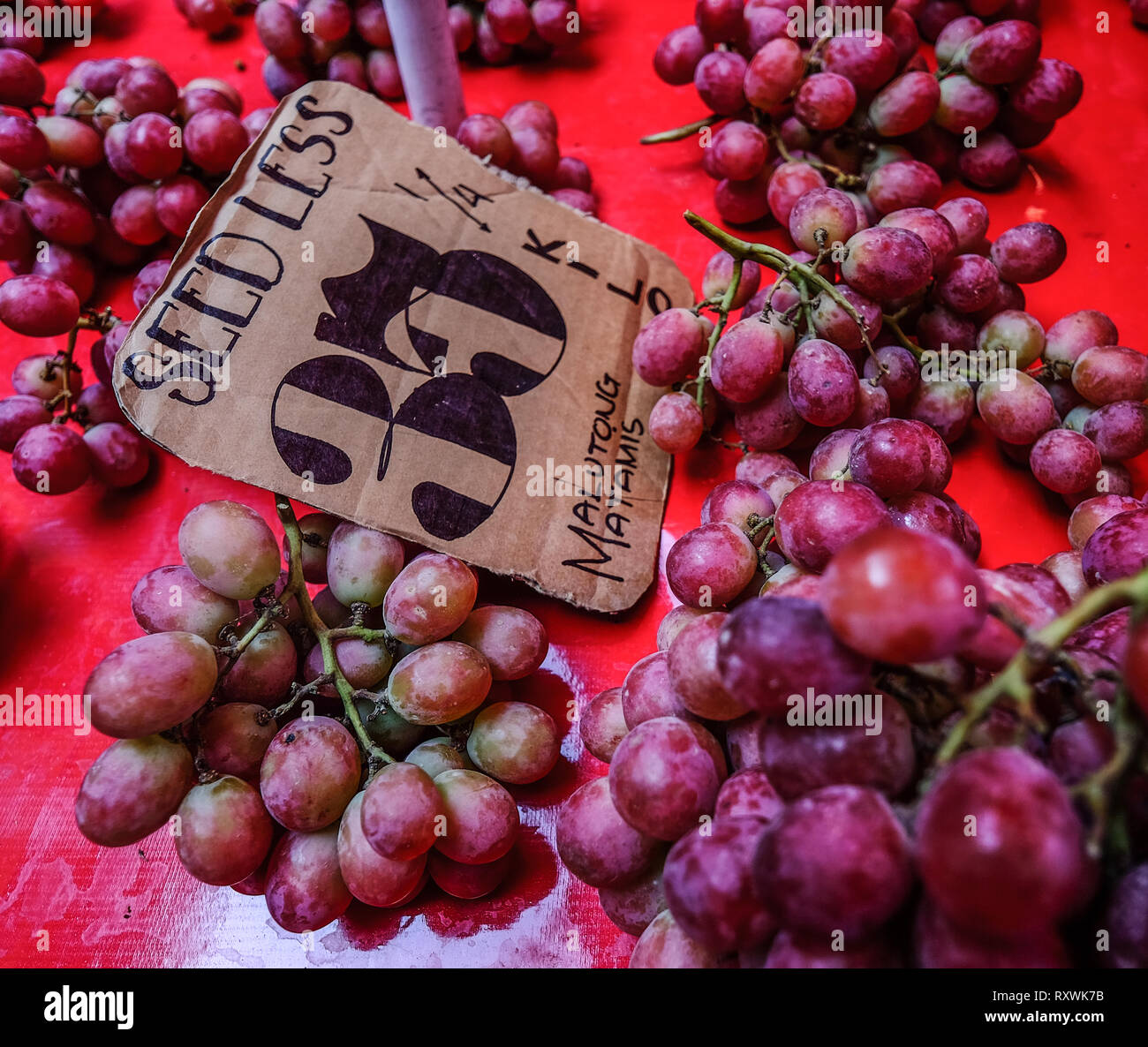 Fresh grape for sale at rural market in Manila, Philippines. (English