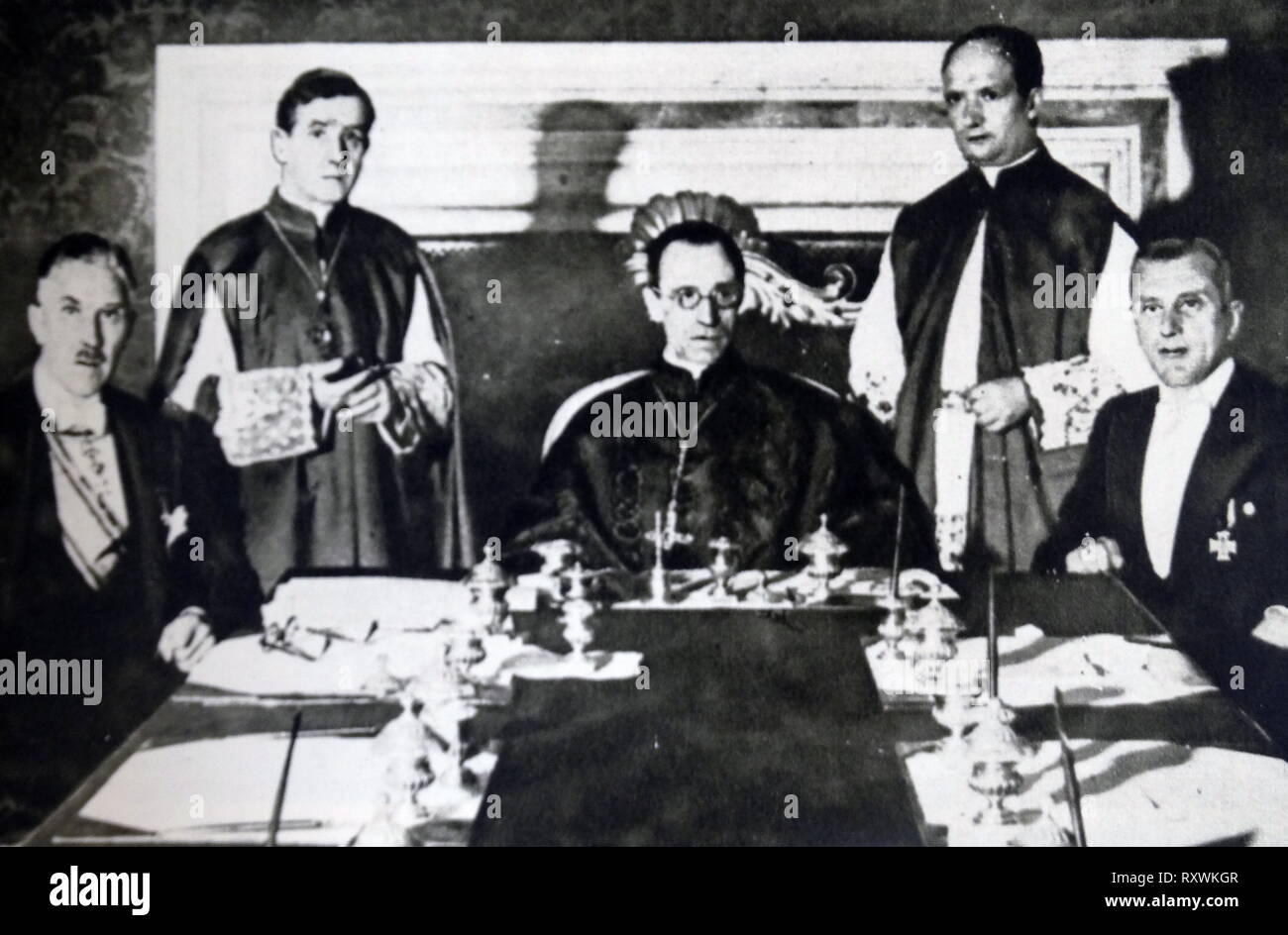The Reichskonkordat 'Concordat between the Holy See and the German Reich', a treaty negotiated between the Vatican and the emergent Nazi Germany. It was signed on 20 July 1933 by Cardinal Secretary of State Eugenio Pacelli, who later became Pope Pius XII, on behalf of Pope Pius XI and Vice Chancellor Franz von Papen on behalf of President Paul von Hindenburg and the German government. It was ratified September 10, 1933 and it has been in force from that date onward. The treaty guarantees the rights of the Roman Catholic Church in Germany. Stock Photo