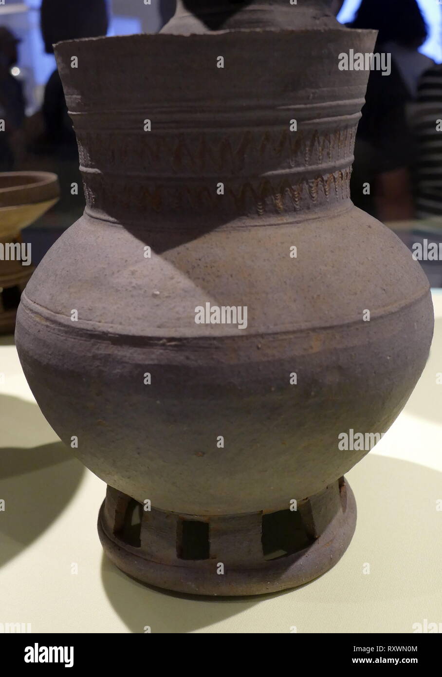 Stoneware Jar, Korean, Three Kingdoms period (Silla kingdom). 400-450 AD; Silla pottery was more similar to Gaya's pottery than any other state's in the Three Kingdoms period. Silla and Gaya pottery was harder and less absorbent than the stoneware made in Baekje and Goryeo. Stock Photo