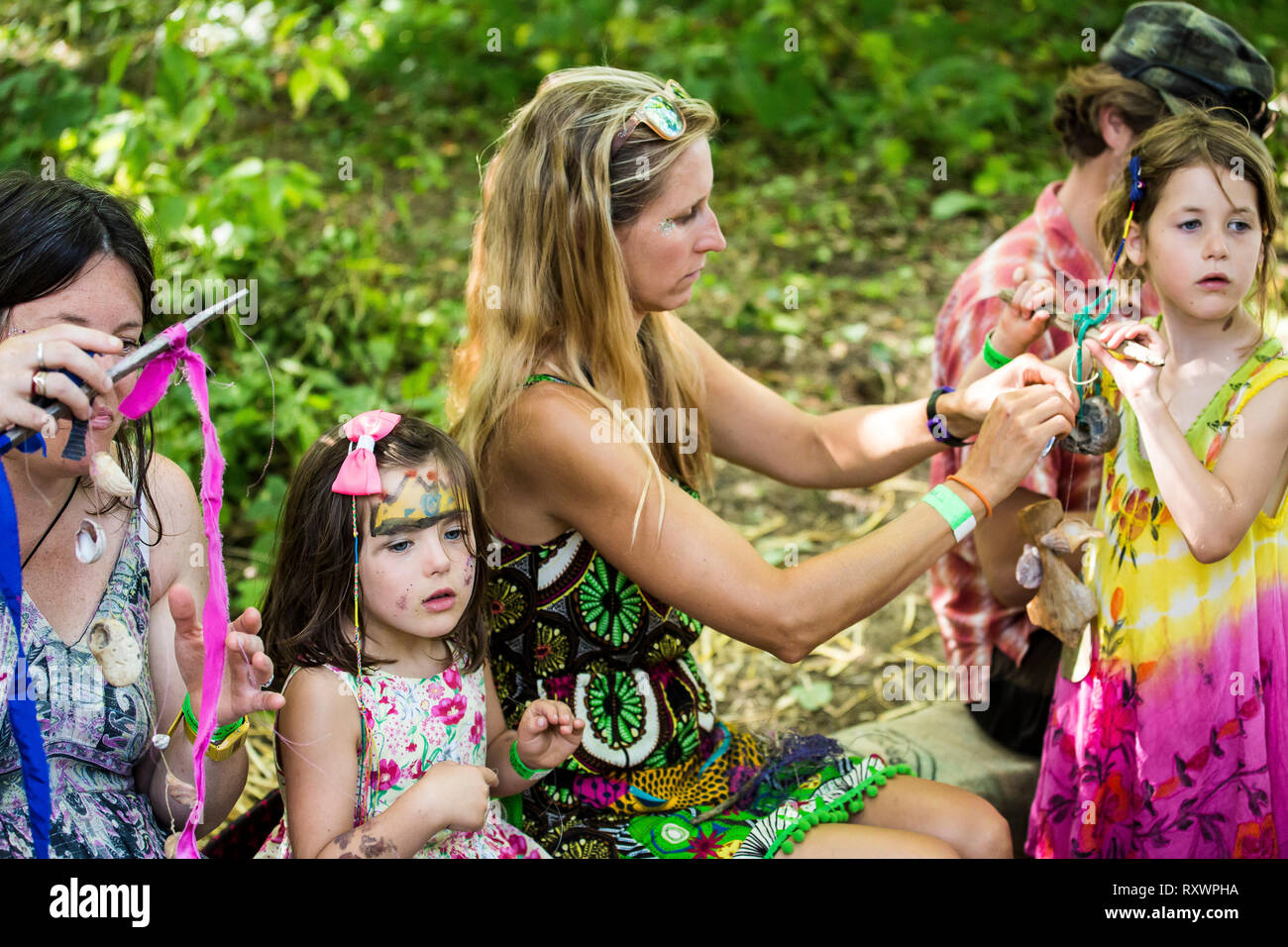 Family festival fun with mum and children at Into the Wild festival, Kent, UK Stock Photo