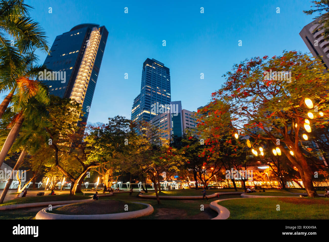 Ayala Triangle Park in the middle of Makati City, Philippines Stock Photo