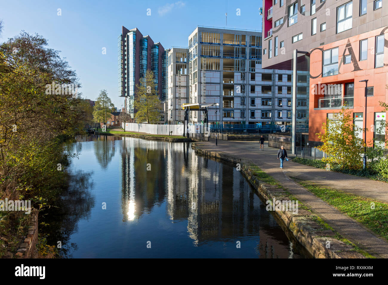 The Islington Wharf, One Vesta Street (under construction) and Chips apartments blocks from the Ashton Canal, Ancoats, Manchester, England, UK Stock Photo