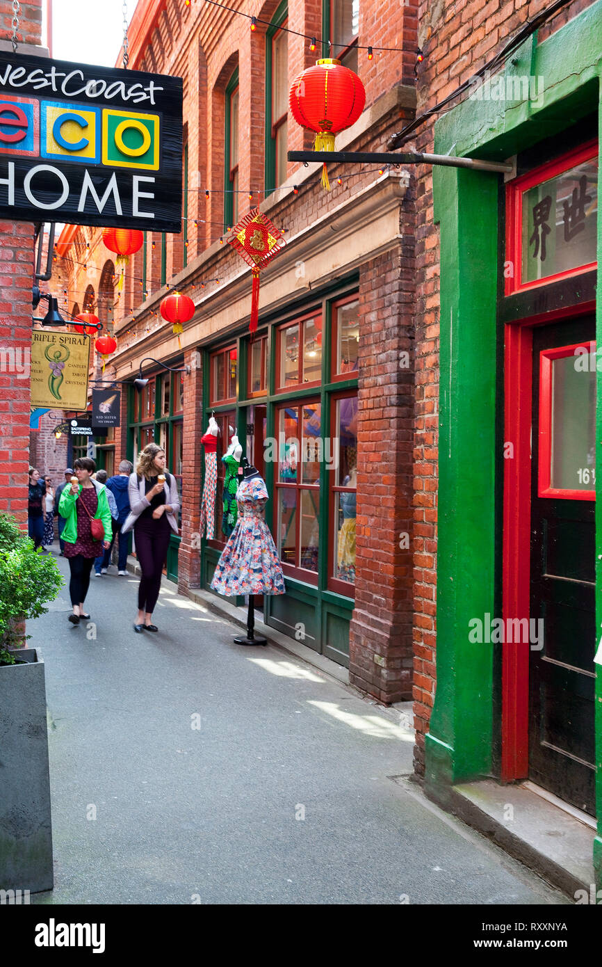 Fan Tan Alley is a very narrow shopping street and popular tourist attraction in the Chinatown district of Victoria, British Columbia, Canada Stock Photo