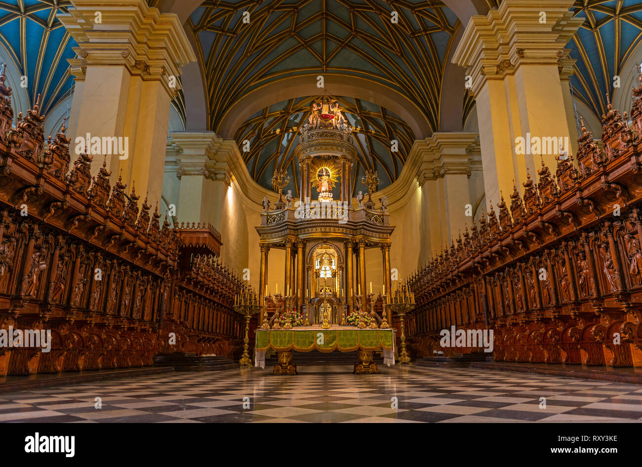 Interior of the Lima Metropolitan Cathedral with the congregation seats and Virgin Mary in baroque style with the main altar, Peru, South America. Stock Photo