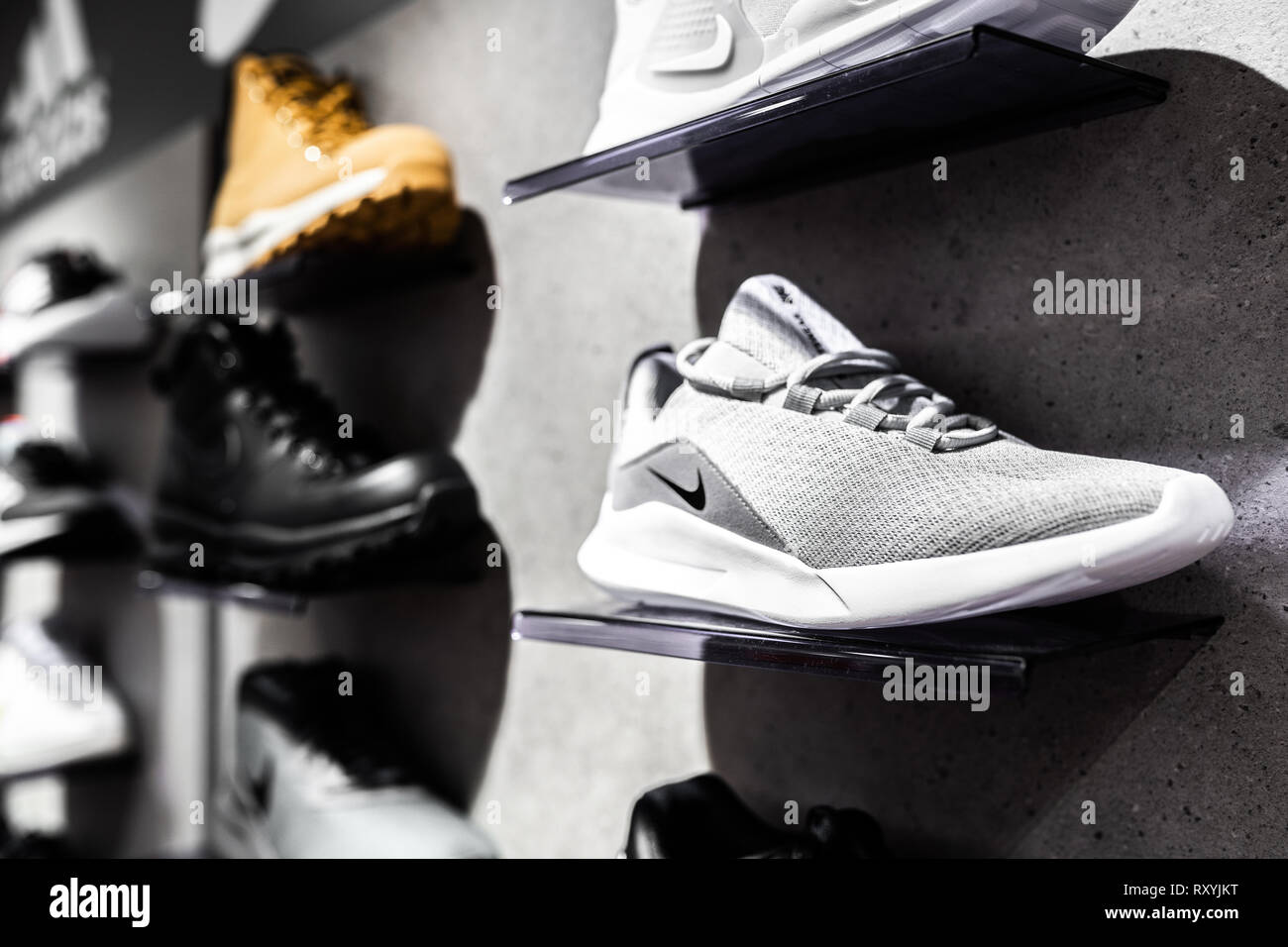 Nurmberg, GERMANY - February 27, 2019: The NIKE black man sneakers on the  shell in the shop. Fashionable foot wear shoes. Close up photo sport  concept Stock Photo - Alamy