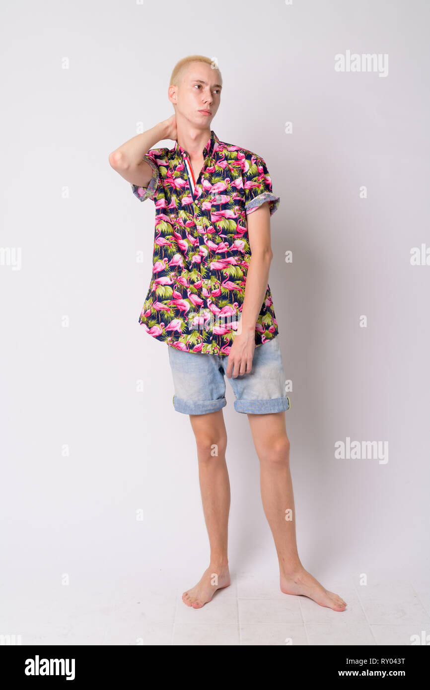 Full body shot of young handsome androgynous tourist man thinking Stock ...