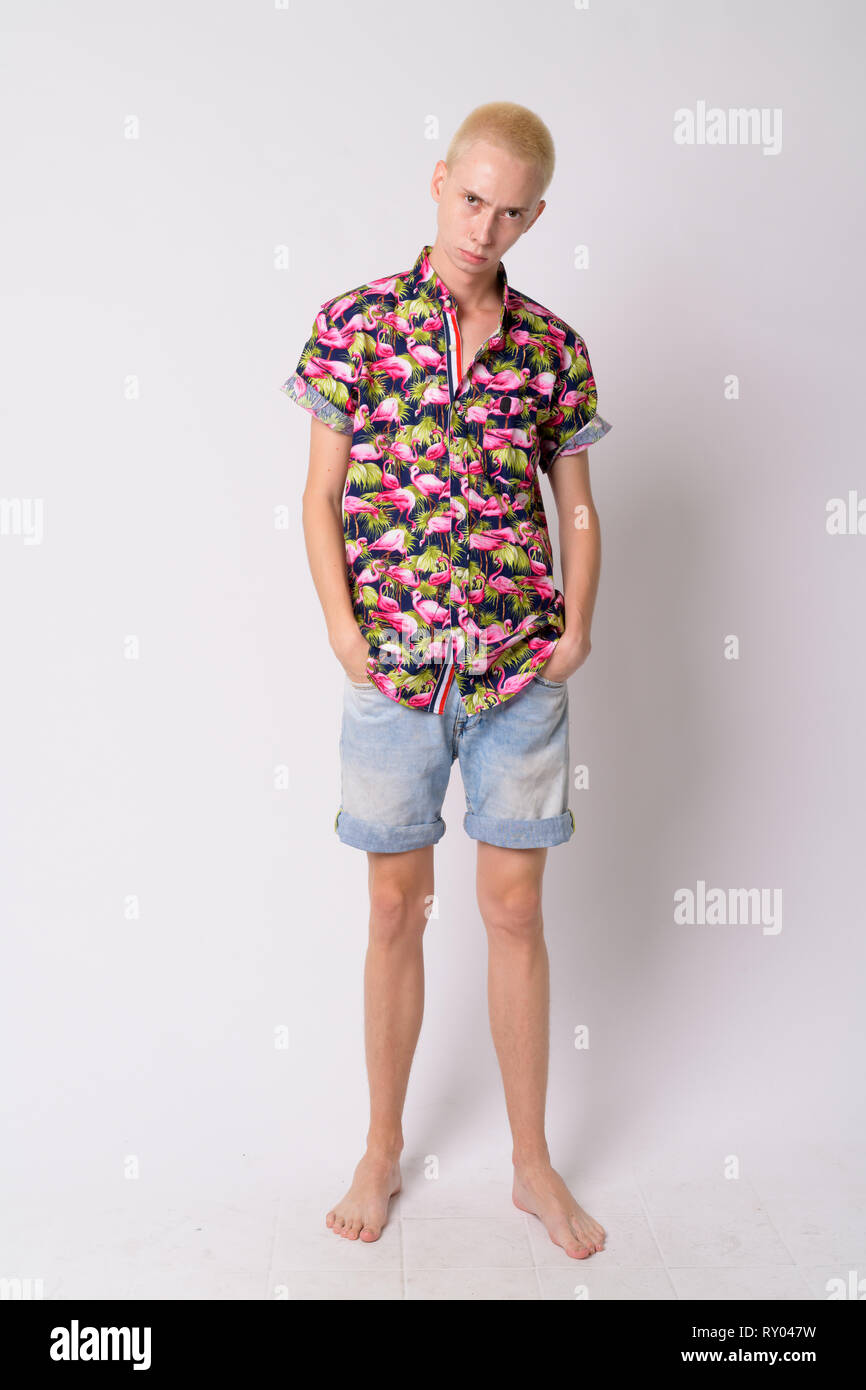 Full body shot of young handsome androgynous tourist man Stock Photo ...