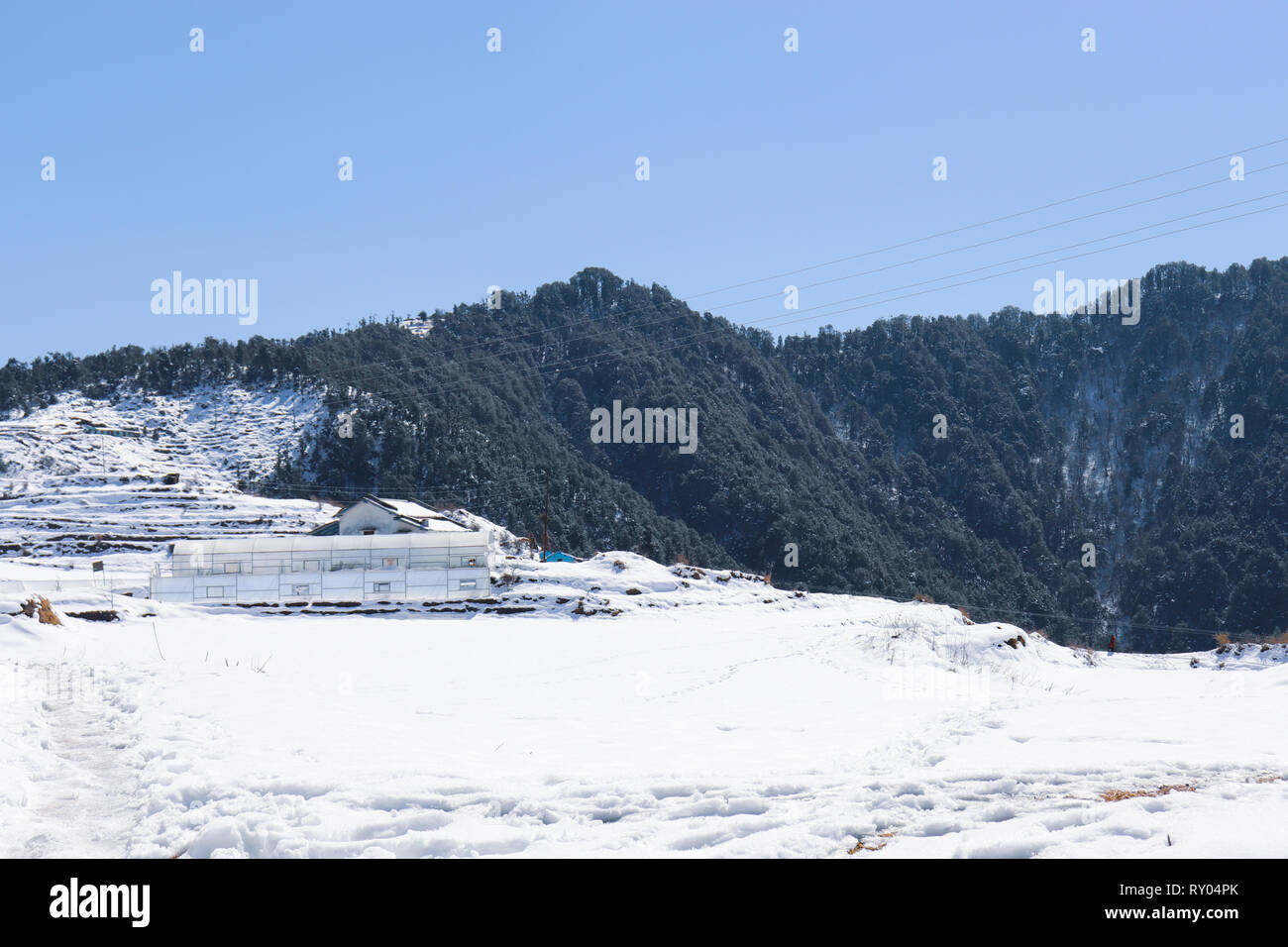 Winter snow covered mountain peaks in India. Stock Photo