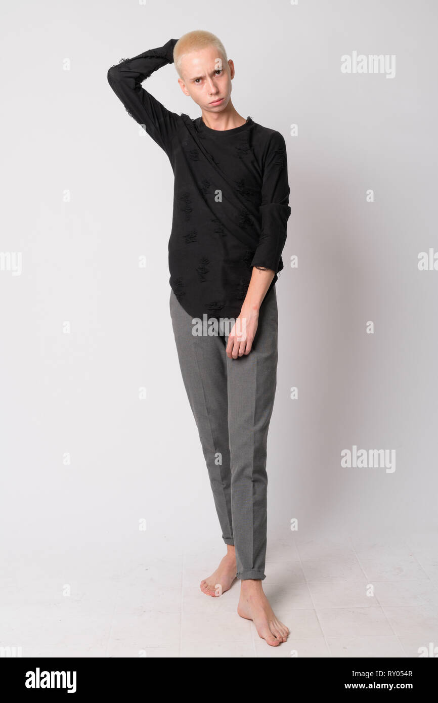 Full body shot of young handsome androgynous man Stock Photo - Alamy