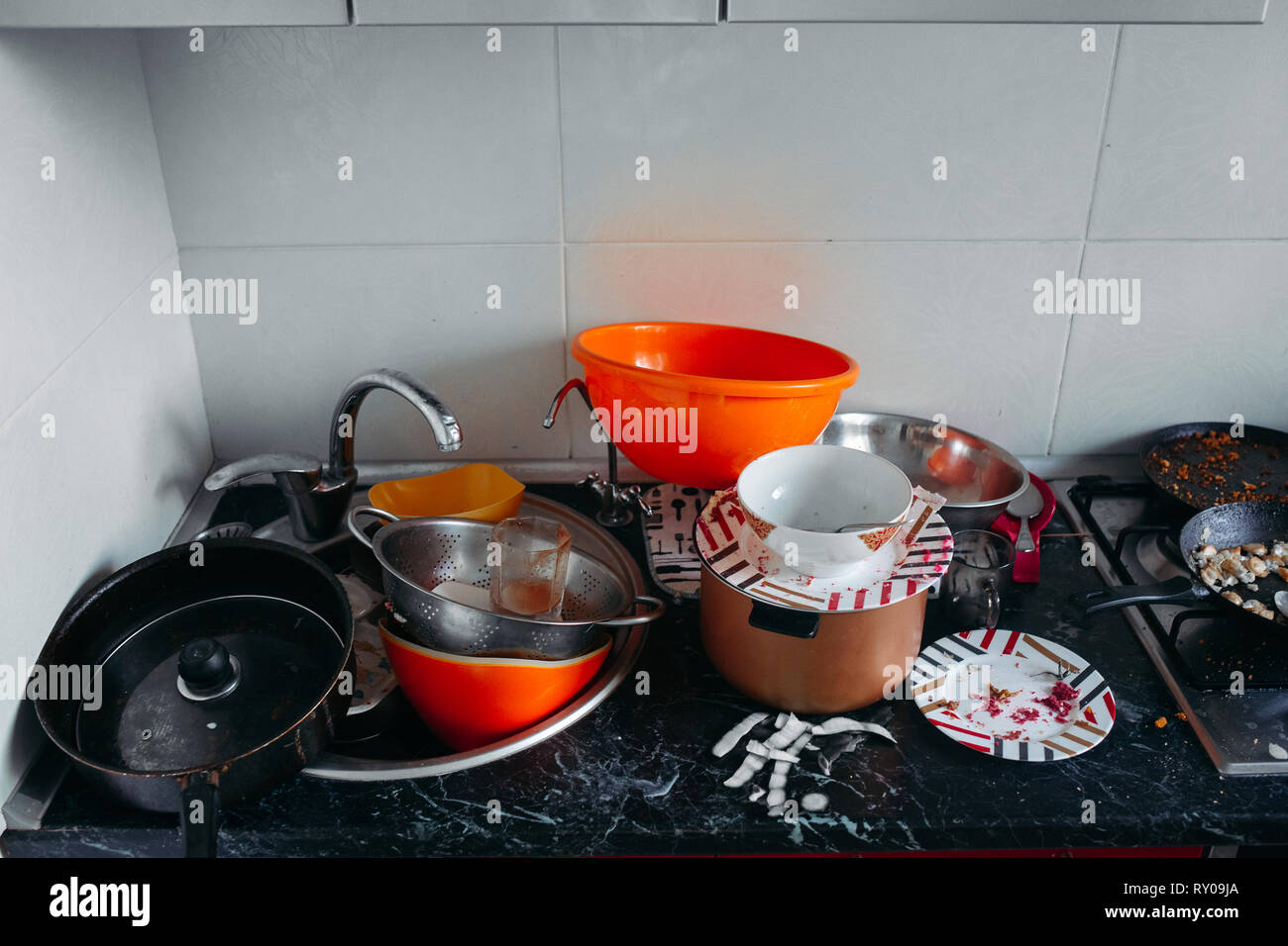 huge heap of dirty dishes waiting for the washing Stock Photo - Alamy