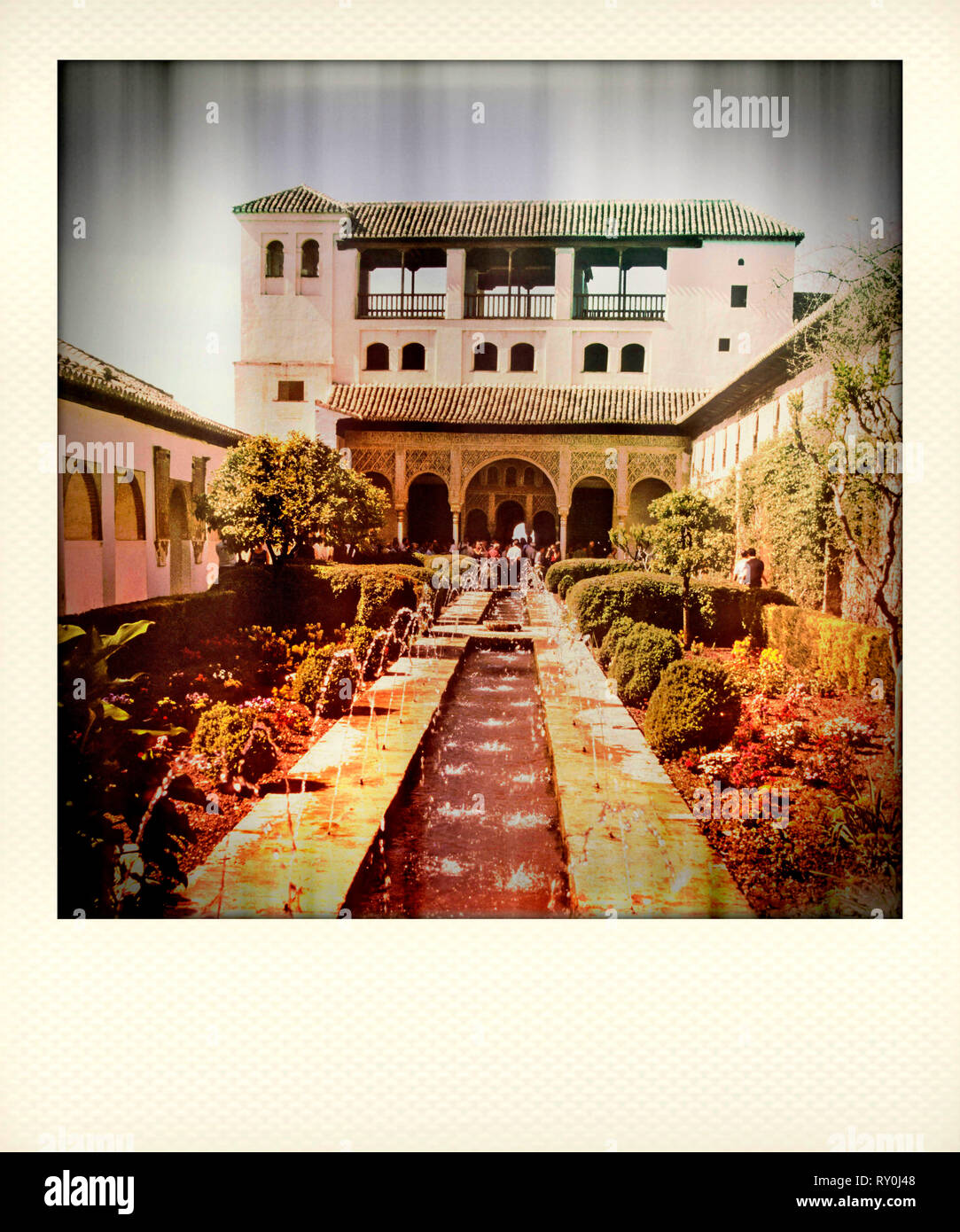 Polaroid effect, Water fountains in the Patio de la Acequi in the Generalife gardens, Alhambra, Granada, Andalucia, Spain Stock Photo