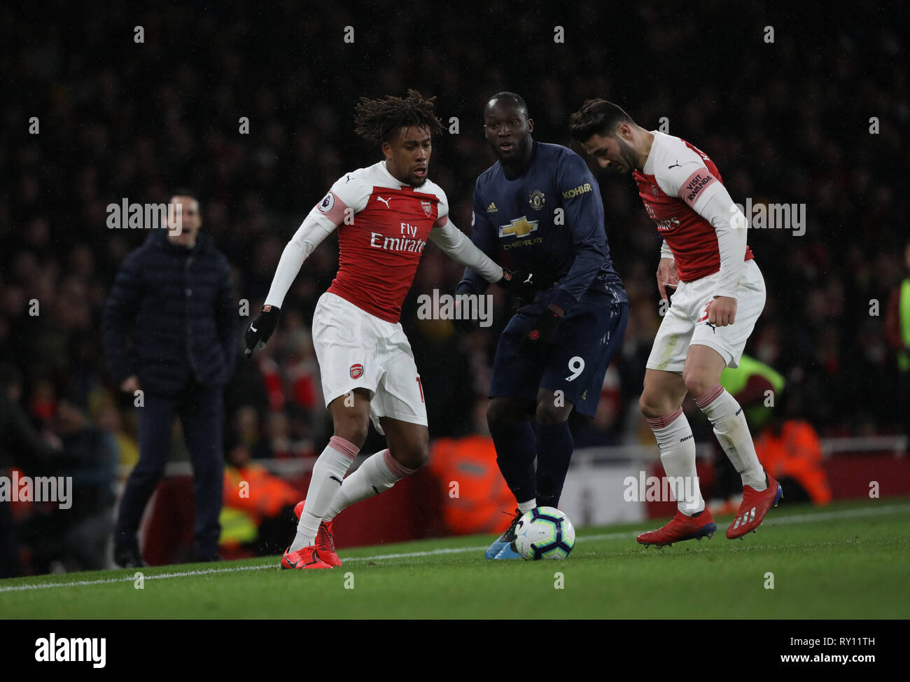 London, UK. 10th Mar, 2019. Alex Iwobi (A) Romelu Lukaku (MU) Sead Kolasinac (A) at the Arsenal v Manchester United English Premier League football match at The Emirates Stadium, London, on March 10, 2019. **Editorial use only, license required for commercial use. No use in betting, games or a single club/league/player publications** Credit: Paul Marriott/Alamy Live News Stock Photo