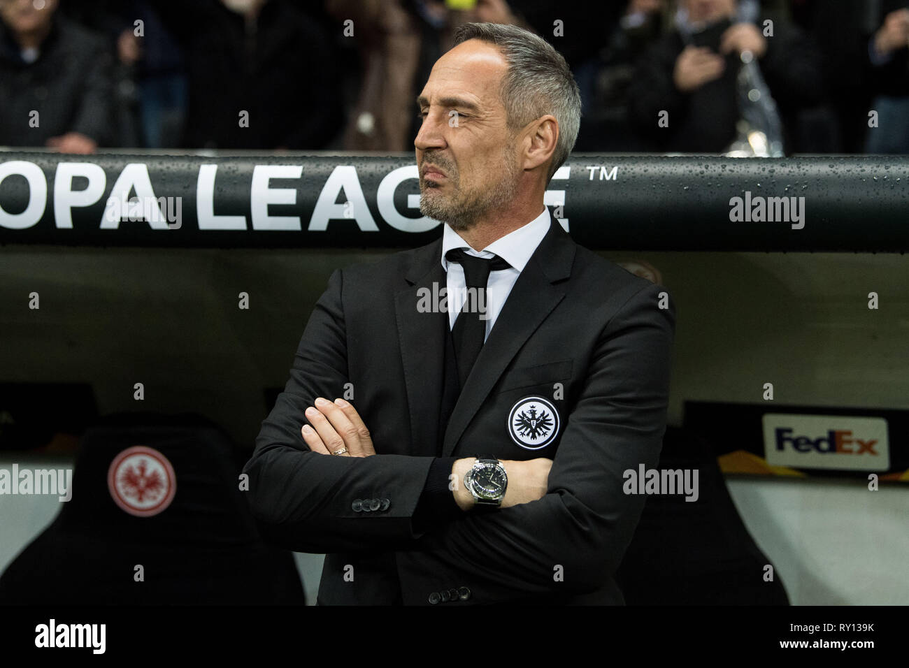 Adi HUETTER (HÃ ¢ tter, coach, F) stands in front of the coachbank and forgives his face, facial expressions, frustrated, frustrated, verbiage, disappointed, disappointed, disappointment, disappointment, sad, half figure, half figure, football Europa League, knockout, first leg, concord Frankfurt (F) - Inter Milan (Inter) 0: 0, on 07.03.2019 in Frankfurt / Germany. | Usage worldwide Stock Photo