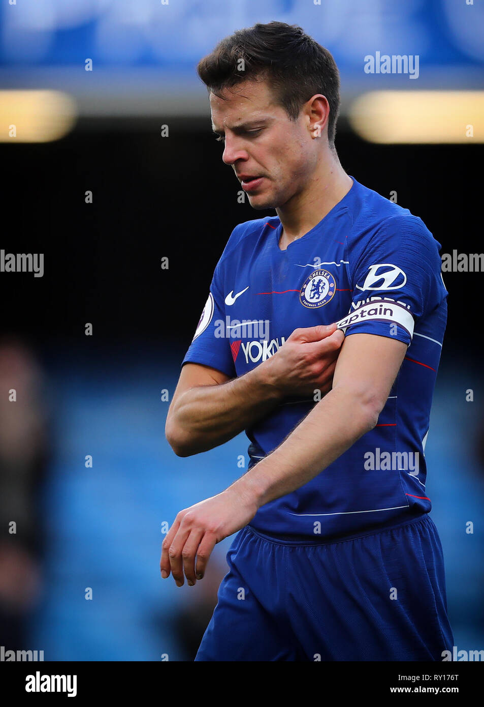 London, UK. 10th Mar, 2019. Cesar Azpilicueta of Chelsea adjusts his  captains armband - Chelsea v Wolverhampton Wanderers, Premier League,  Stamford Bridge, London - 10th March 2019 Editorial Use Only - DataCo