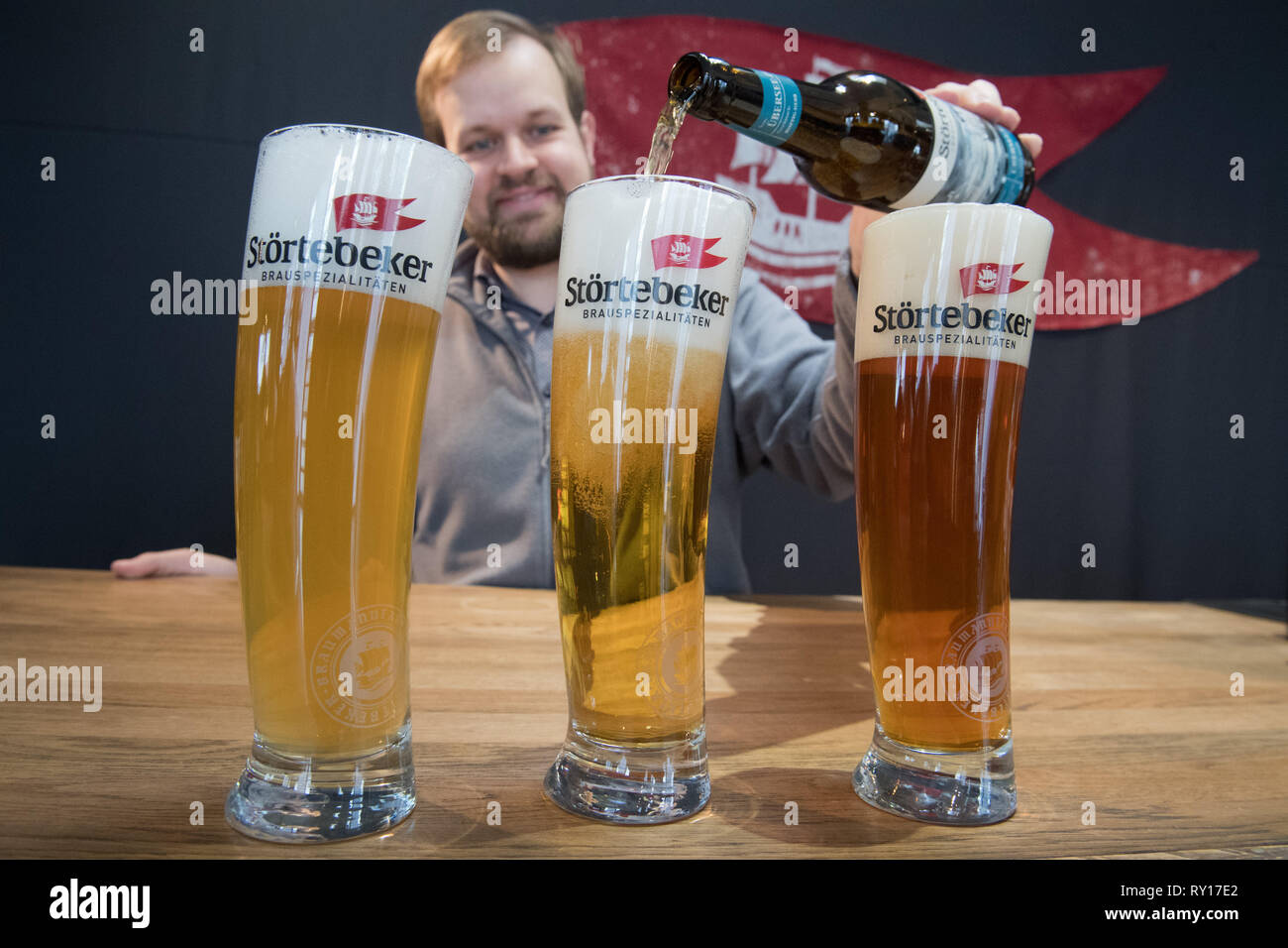 Stralsund, Germany. 11th Mar, 2019. The master brewer Jens Reineke tests the beer varieties Störtebeker Witt-Bier (l-r), Störtebeker Übersee-Pils and Störtebeker Baltik-Lager. Beer has been brewed in the traditional brewery of the Hanseatic city since 1827. The Störtebeker brewery presented new products and projects on the same day. The assortment will therefore grow to 20 varieties this year. 2018 was a record year for the Stralsund company. 248,000 hectolitres were sold. Credit: Stefan Sauer/dpa-Zentralbild/dpa/Alamy Live News Stock Photo