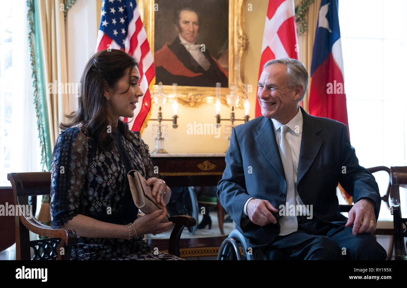 Mary, Crown Princess of Denmark, left, visits with Texas governor Greg Abbott, center, and wife Cecilia during a stop at the Texas Governor's Mansion in Austin. The Crown Princess is on a three-day Texas swing that includes appearances at Austin's SXSW Conference. Stock Photo