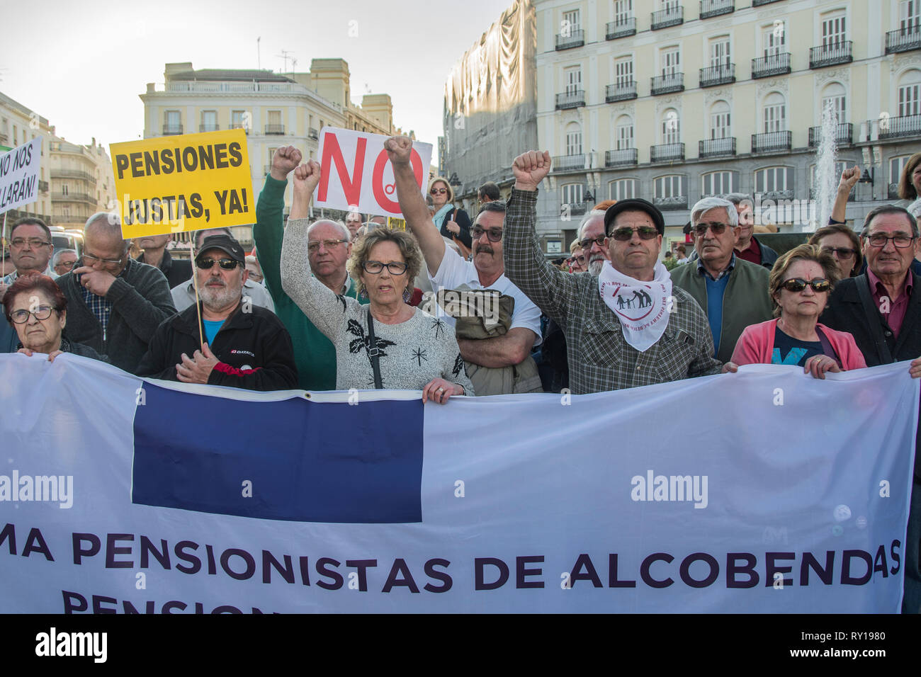 Madrid, Spain. 11th March, 2019. People with placards, ¨fair pensions, now! no more pension cuts¨. People from different regions of Madrid demonstrates againts pension cuts in Spain Credit: Alberto Sibaja Ramírez/Alamy Live News Stock Photo