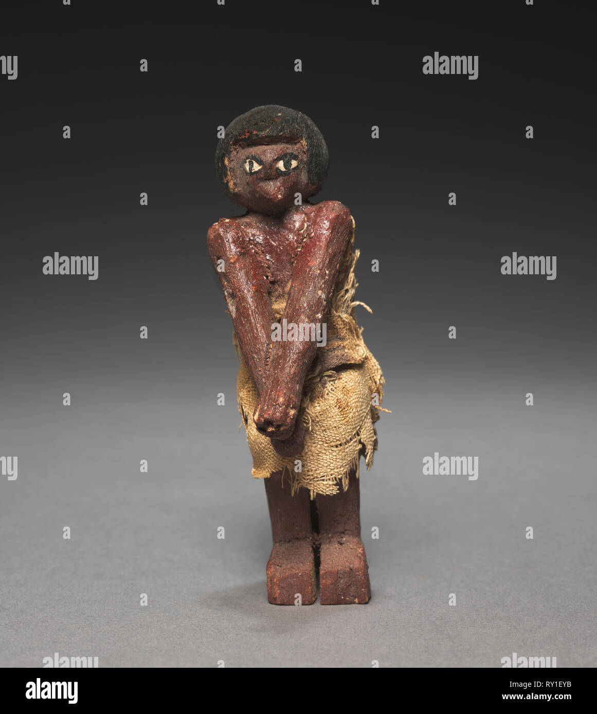 Seated Model Sailor, 2000-1000 BC. Egypt, Middle Kingdom, late Dynasty 11 (2040-1980 BC) to early Dynasty 12 (1980-1951 BC). Painted sycamore fig; average: 11 cm (4 5/16 in Stock Photo