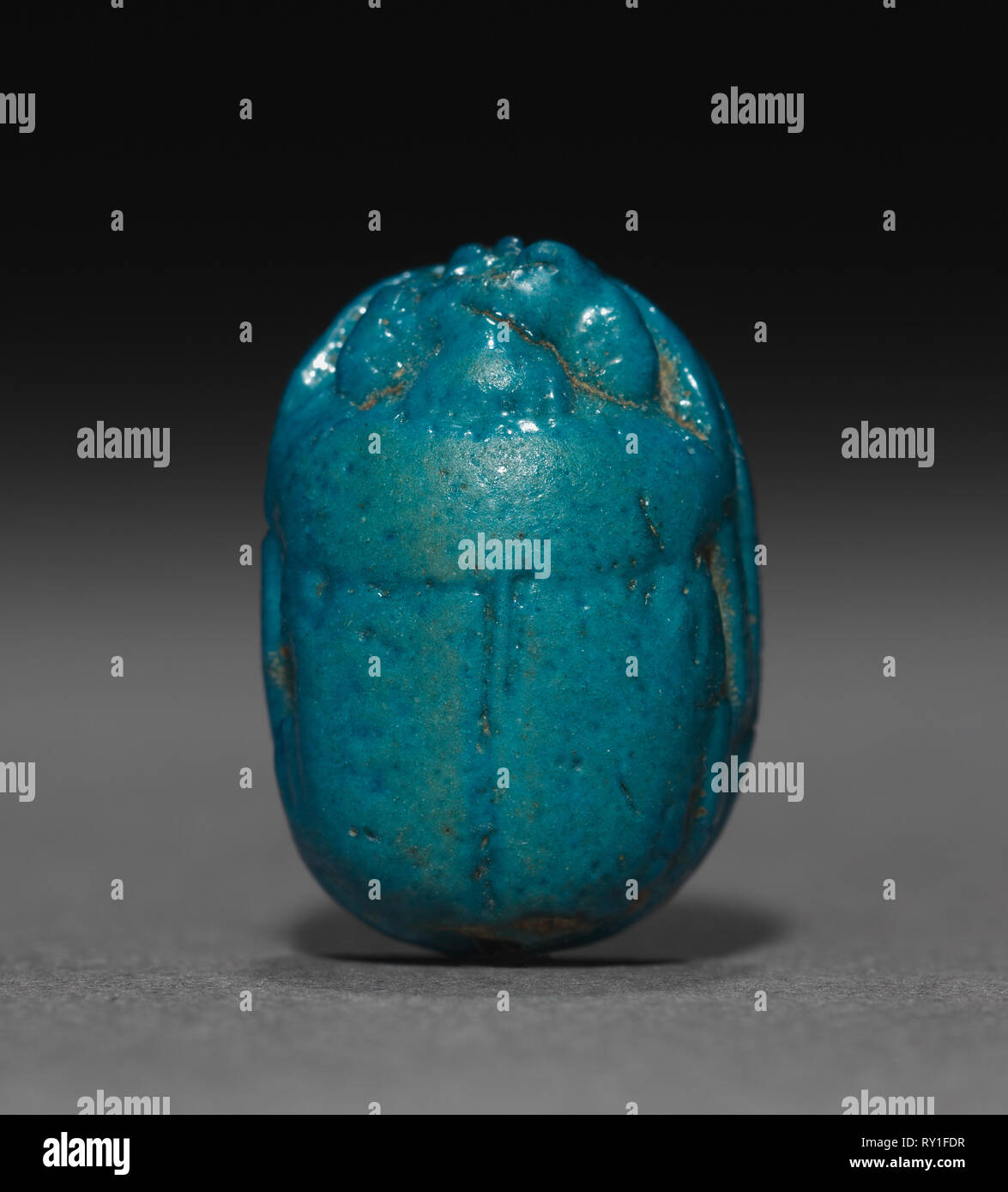 Amen-Ra Scarab, 1540-1186 BC. Egypt, New Kingdom, Dynasties 18 (1540-1296 BC) - 19 (1295-1186 BC) or later. Blue-glazed faience; overall: 1.3 cm (1/2 in Stock Photo