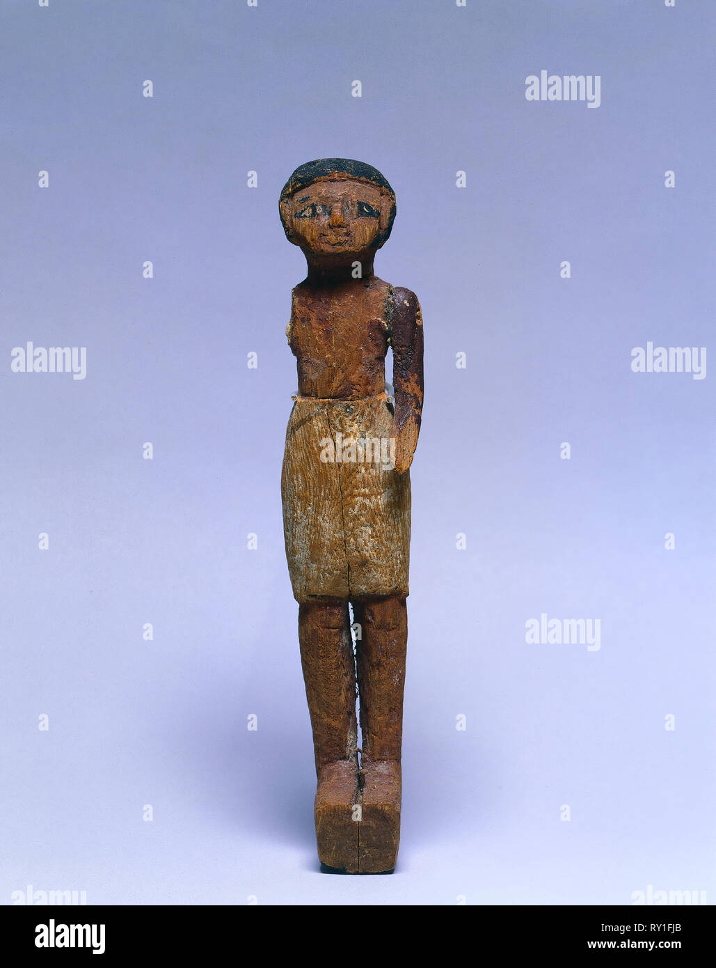 Model Figure of a Man, 1980-1801 BC. Egypt, Middle Kingdom, Dynasty 12, 1980-1801 BC. Painted wood; overall: 22 x 5.2 x 3.6 cm (8 11/16 x 2 1/16 x 1 7/16 in Stock Photo