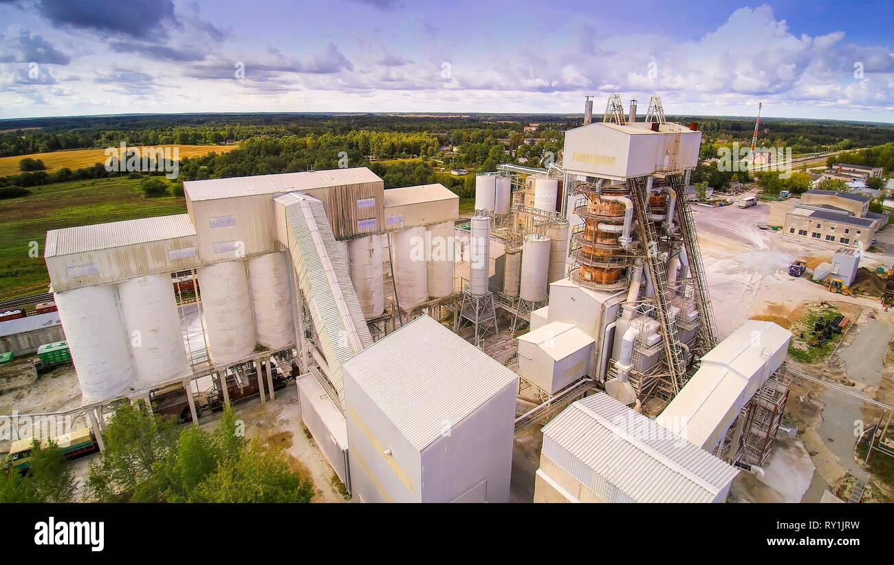 Aerial view of the factory of limestones. Seen the white buildings stones and machineries working inside the area Stock Photo