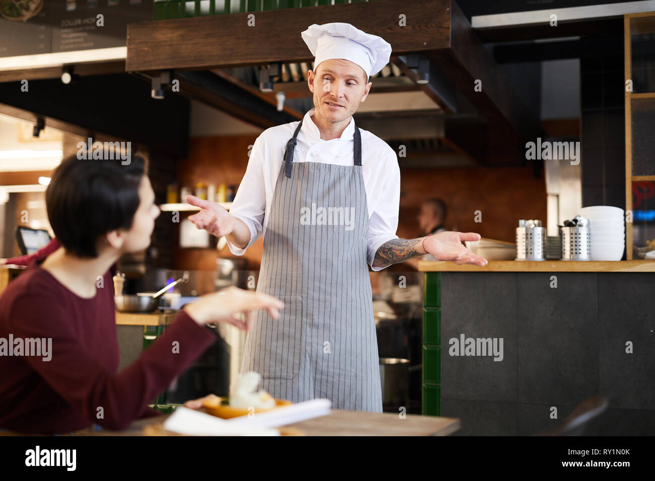 Client Complaining in Restaurant Stock Photo