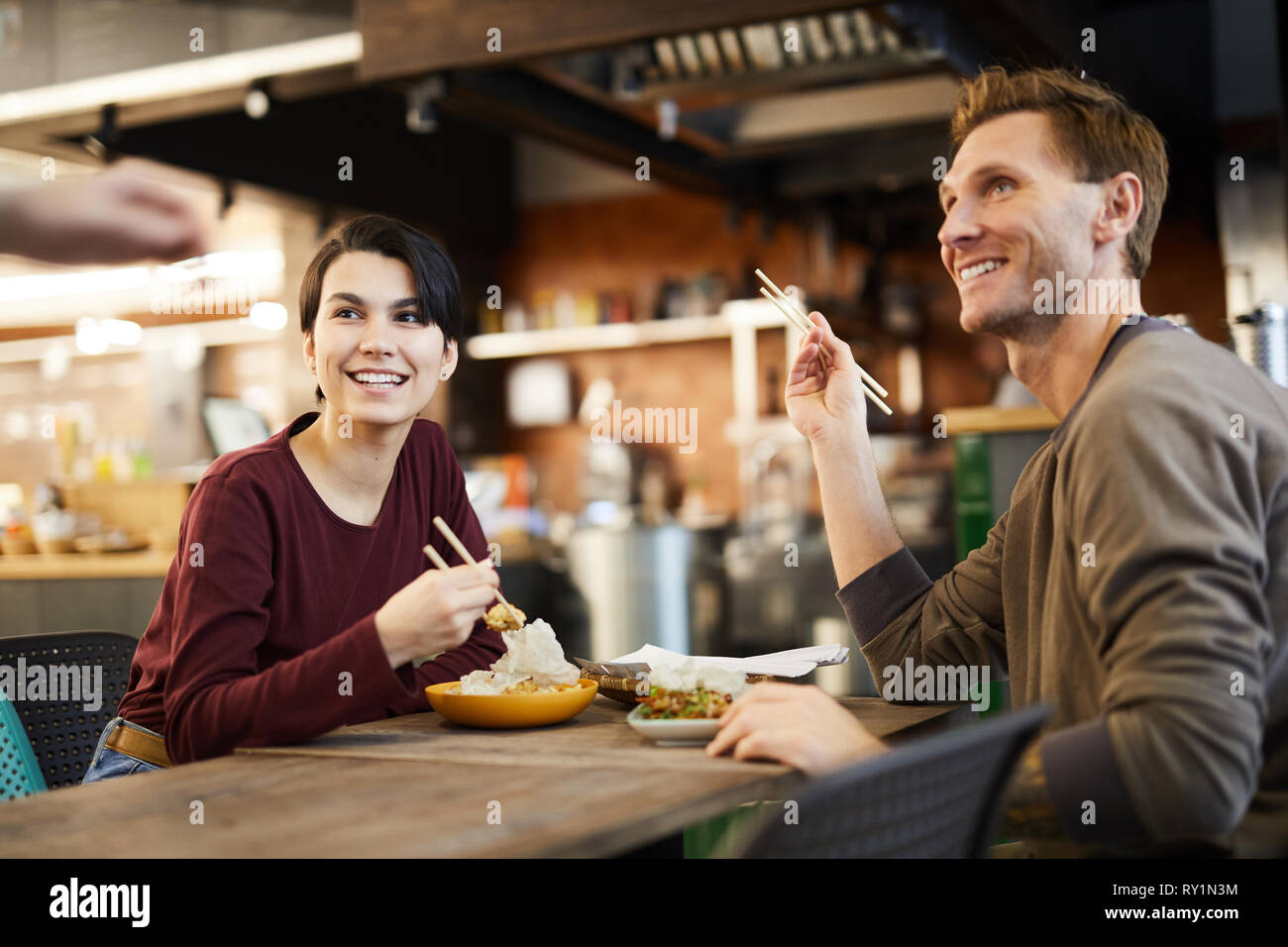 Couple in Chinese Restaurant Stock Photo