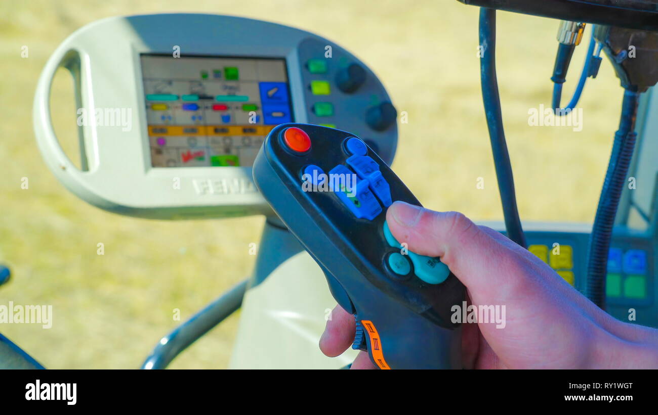 The controller of the forest harvester found inside the dashboard in the truck Stock Photo