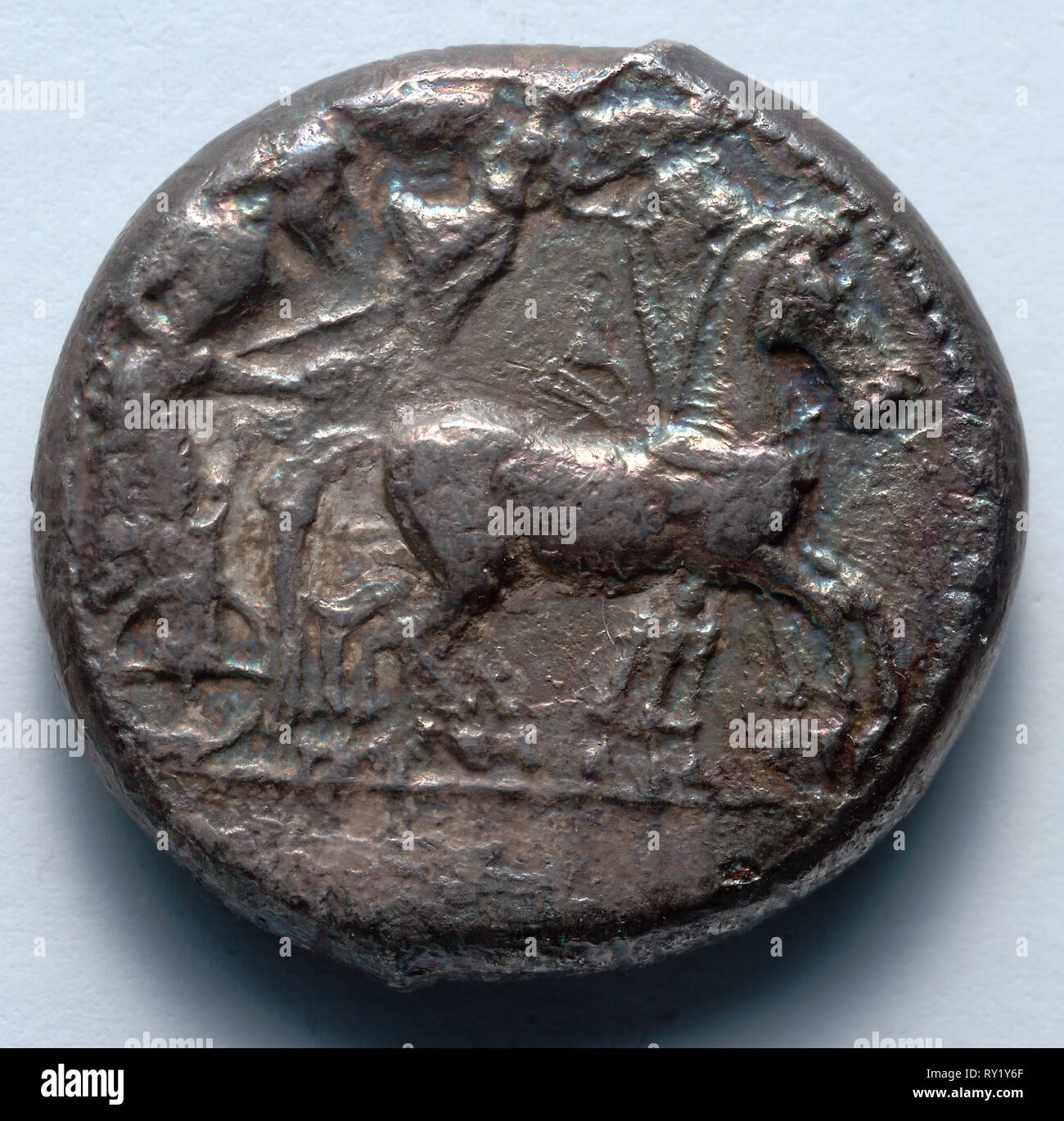 Tetradrachm: Quadriga (obverse), 485-478 BC. Greece, 5th century BC. Silver; diameter: 2.4 cm (15/16 in Stock Photo