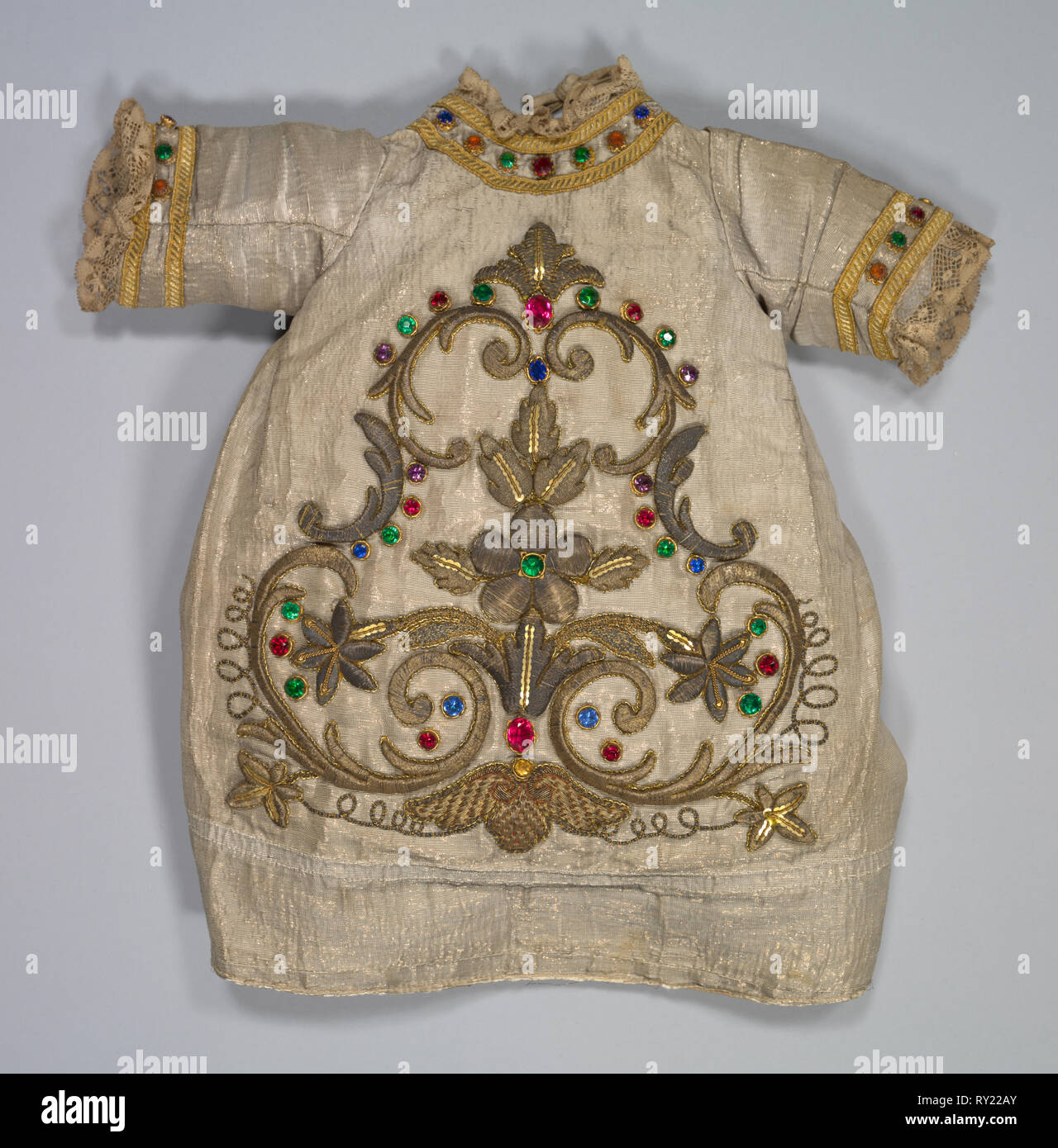 Baby's Robe, 17th century. Spain, 17th century. Cloth embroidererd in gold and silver; overall: 35 x 31 cm (13 3/4 x 12 3/16 in Stock Photo