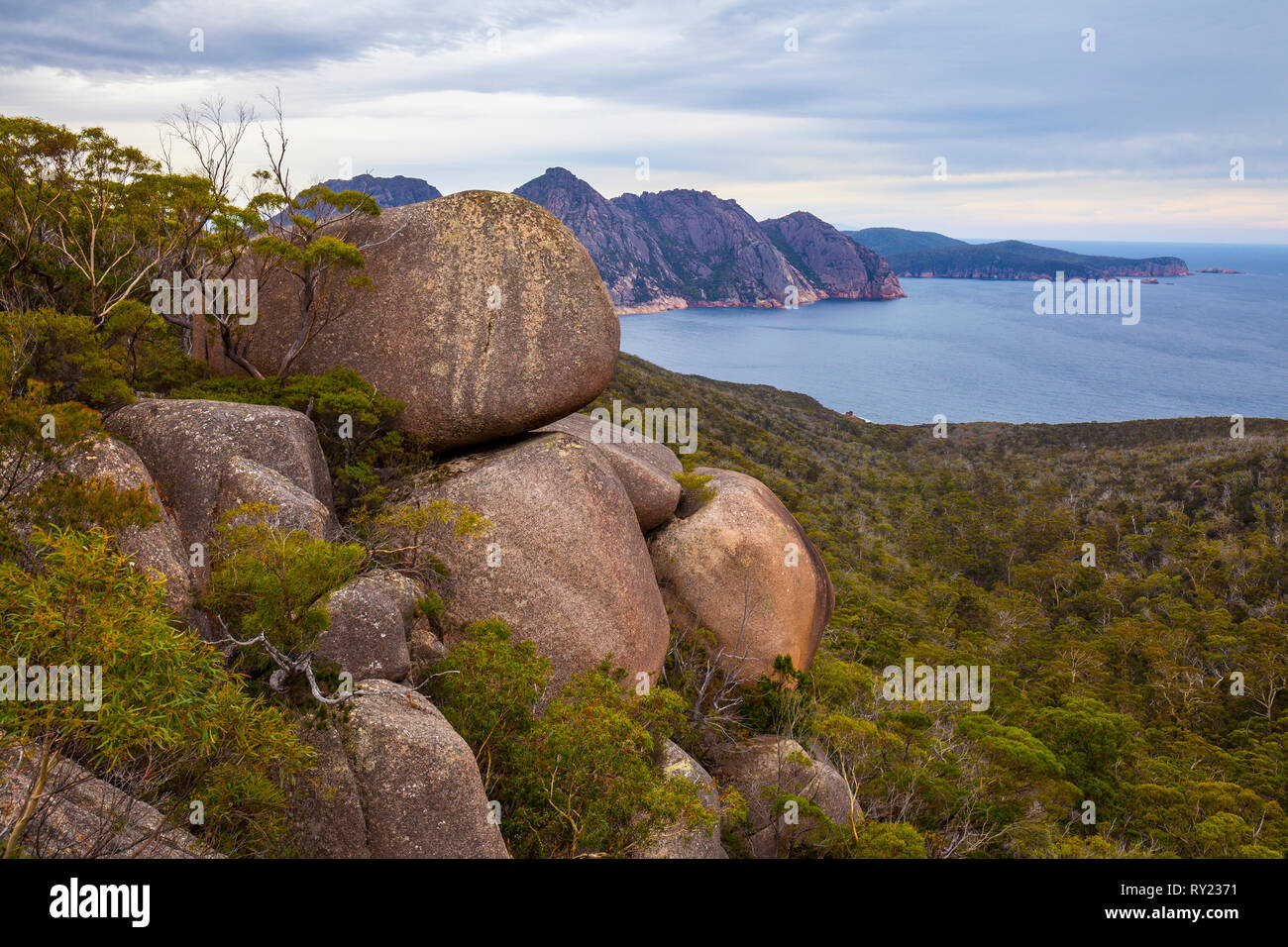 Giant granite boulders and The Hazards - Freycinet National Park - Tasmania Stock Photo