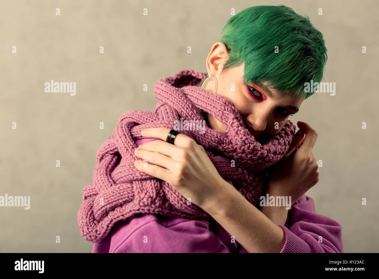 Nice green haired woman looking at you Stock Photo