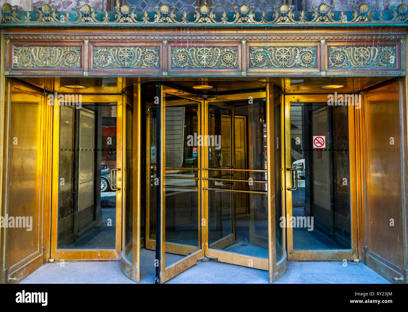 Montreal, Quebec, Canada-March 9 2019: Old hotel golden revolving doors in downtown montral Stock Photo