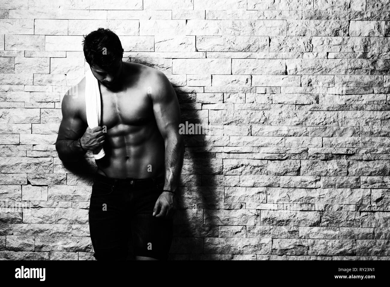 Portrait of a Young Physically Fit Man Showing His Well Trained Body