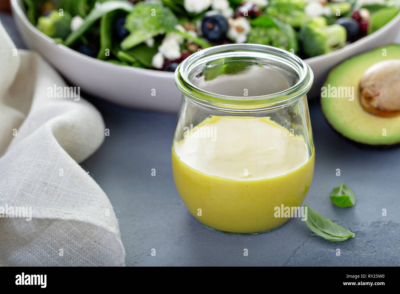 Healthy honey mustard dressing with avocado Stock Photo Alamy