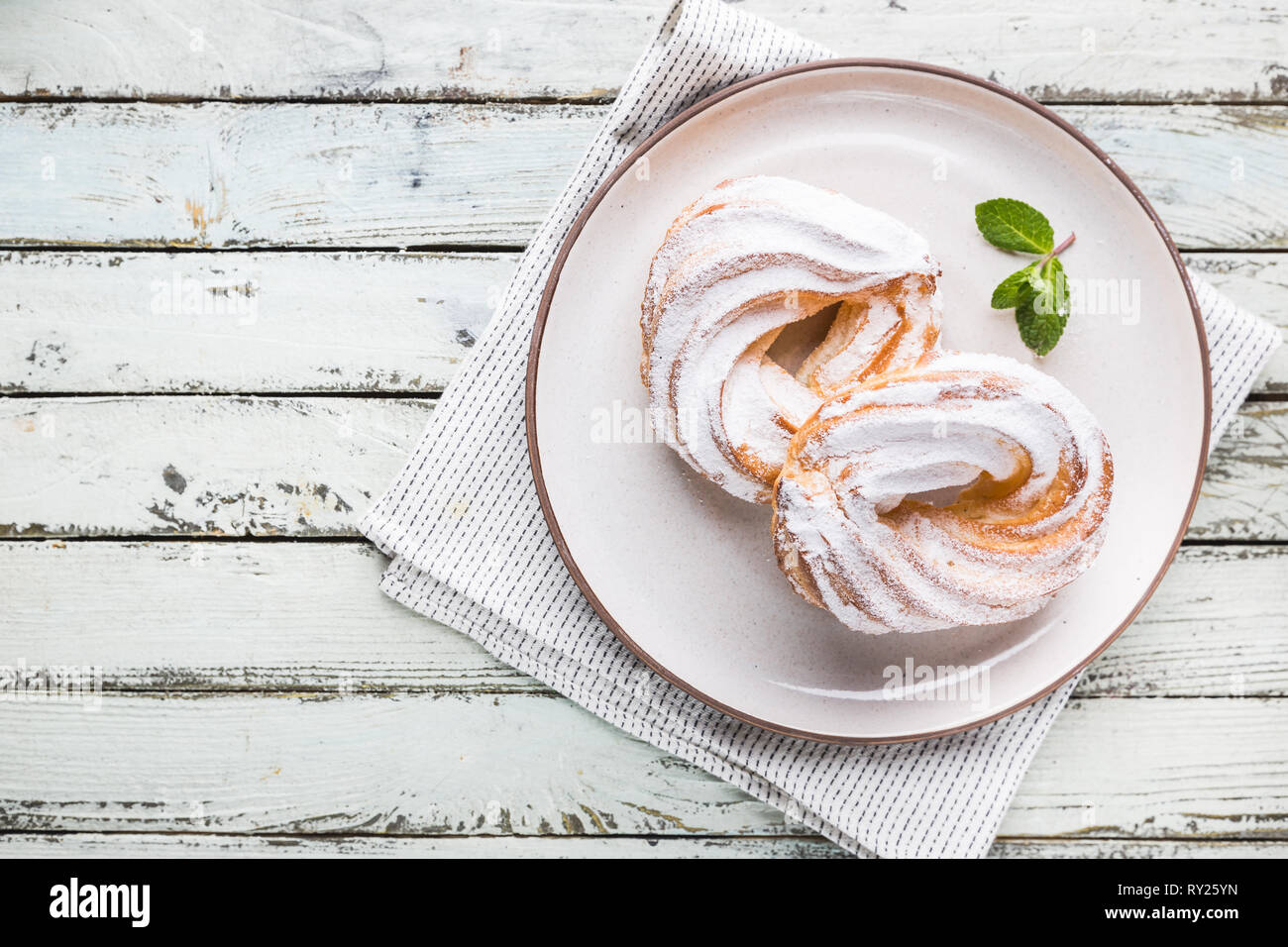 Custard Or Cottage Cheese Cakes Rings On A White Plate Top View