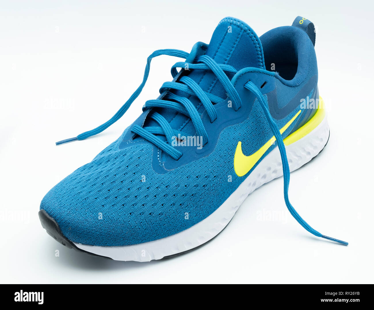 Blue Nike Odyssey React running shoe cut out isolated on white background  Stock Photo - Alamy