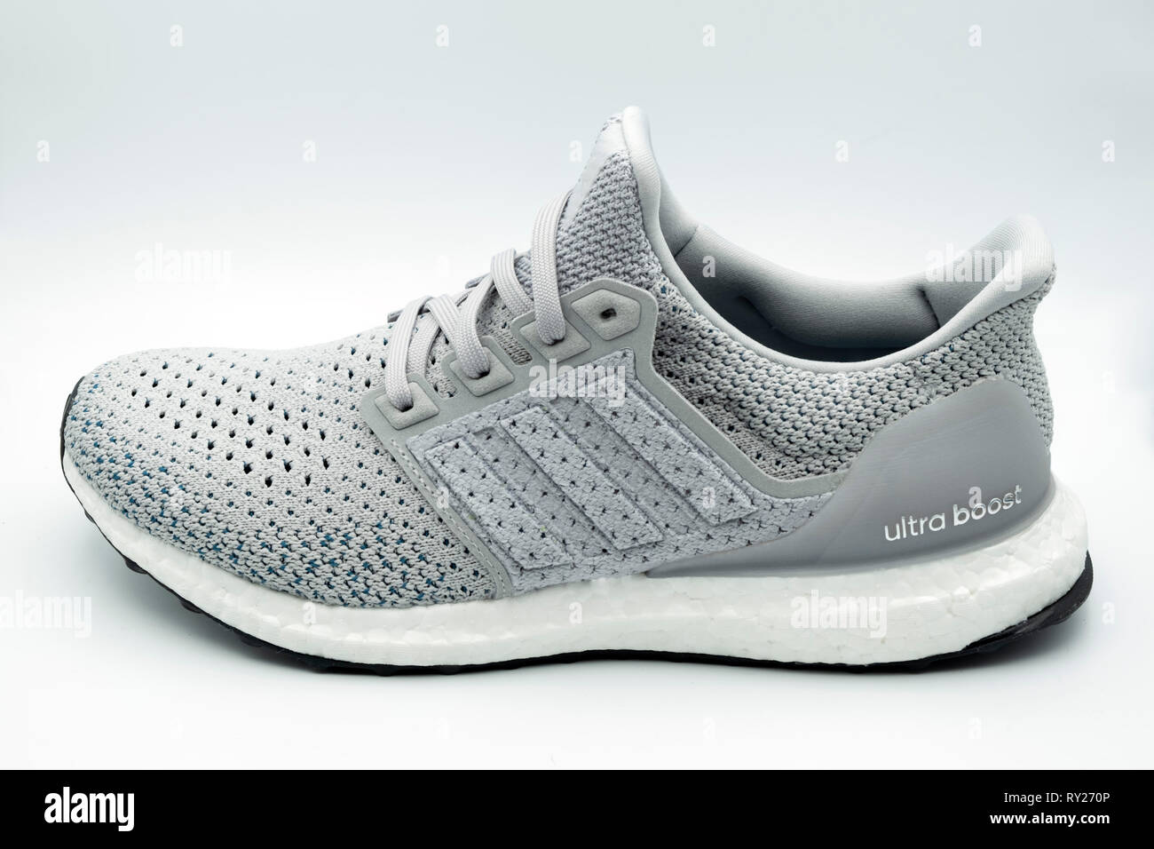 Side view of a grey Adidas Ultraboost Clima running shoe cut out isolated  on white background Stock Photo - Alamy