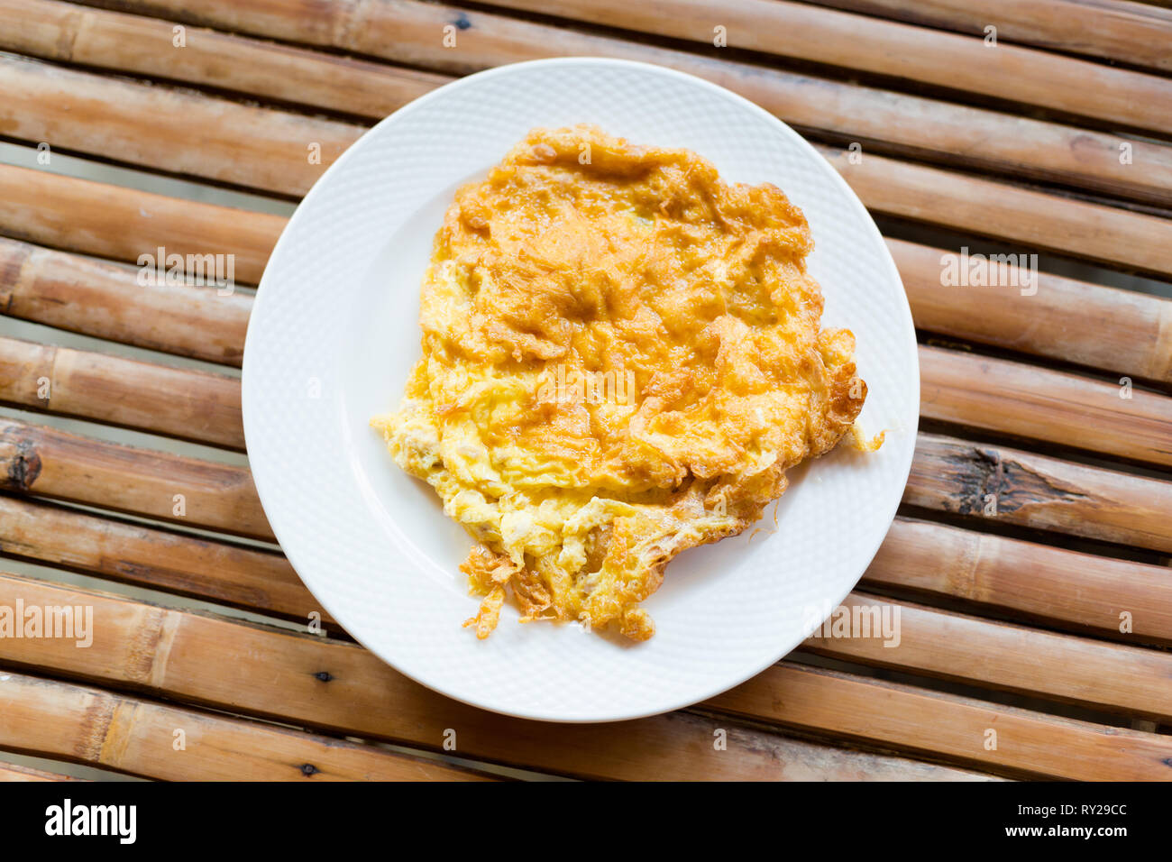 Fresh prepared asian deep fried crispy egg omelette. Traditional thai
